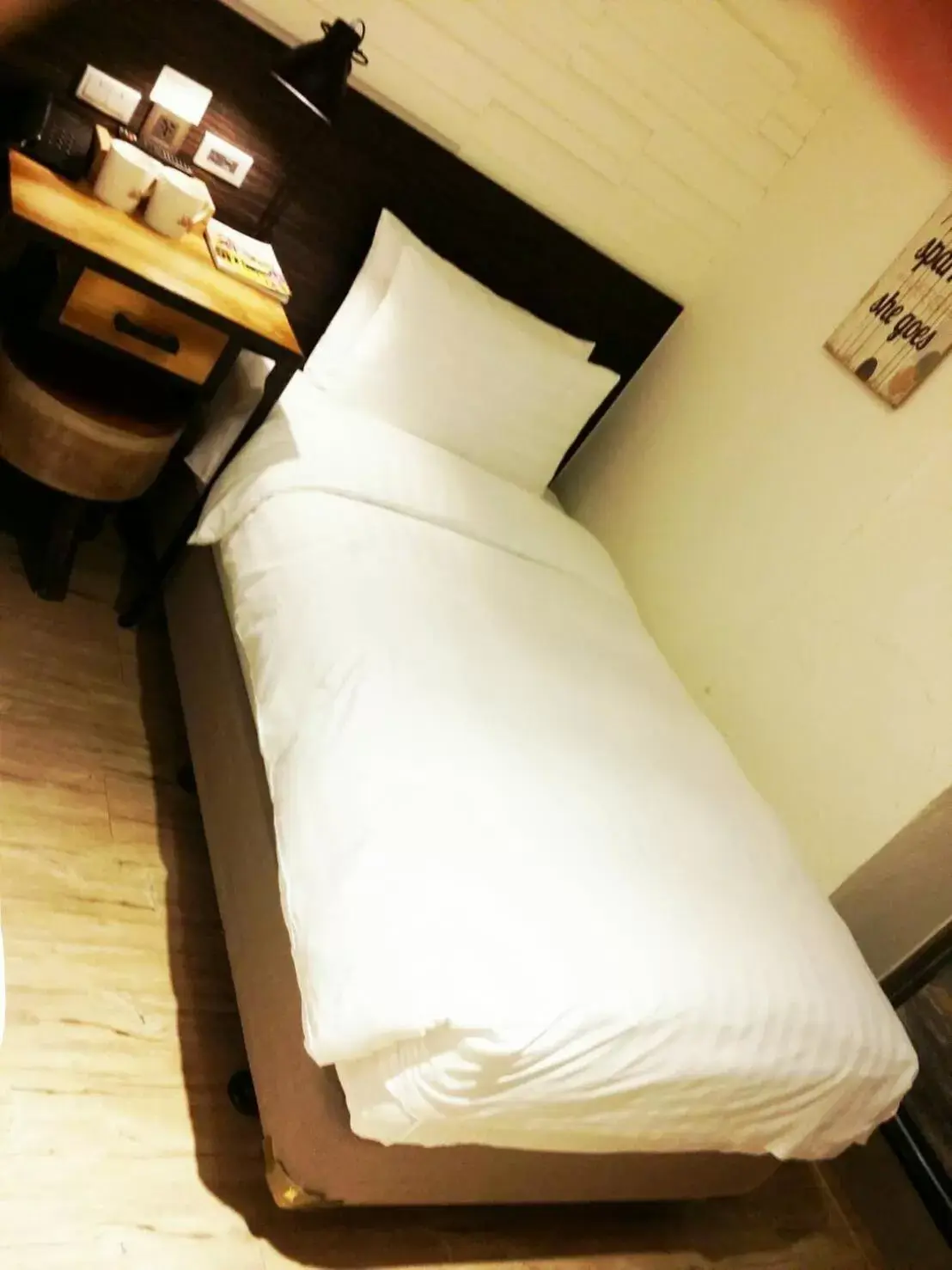 Bed in Re-Change Hotel Taipei