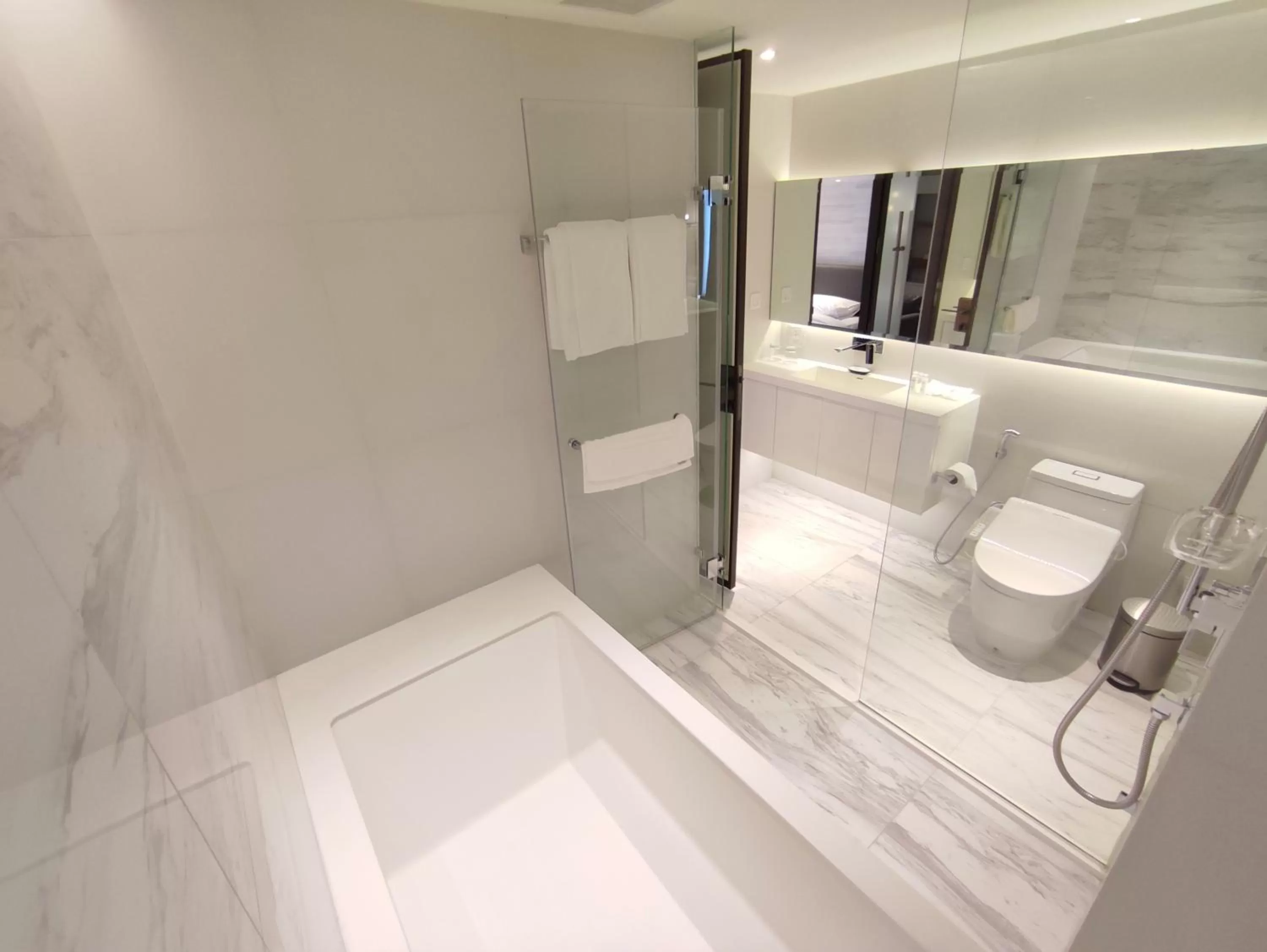 Bathroom in ashley hotel bkk