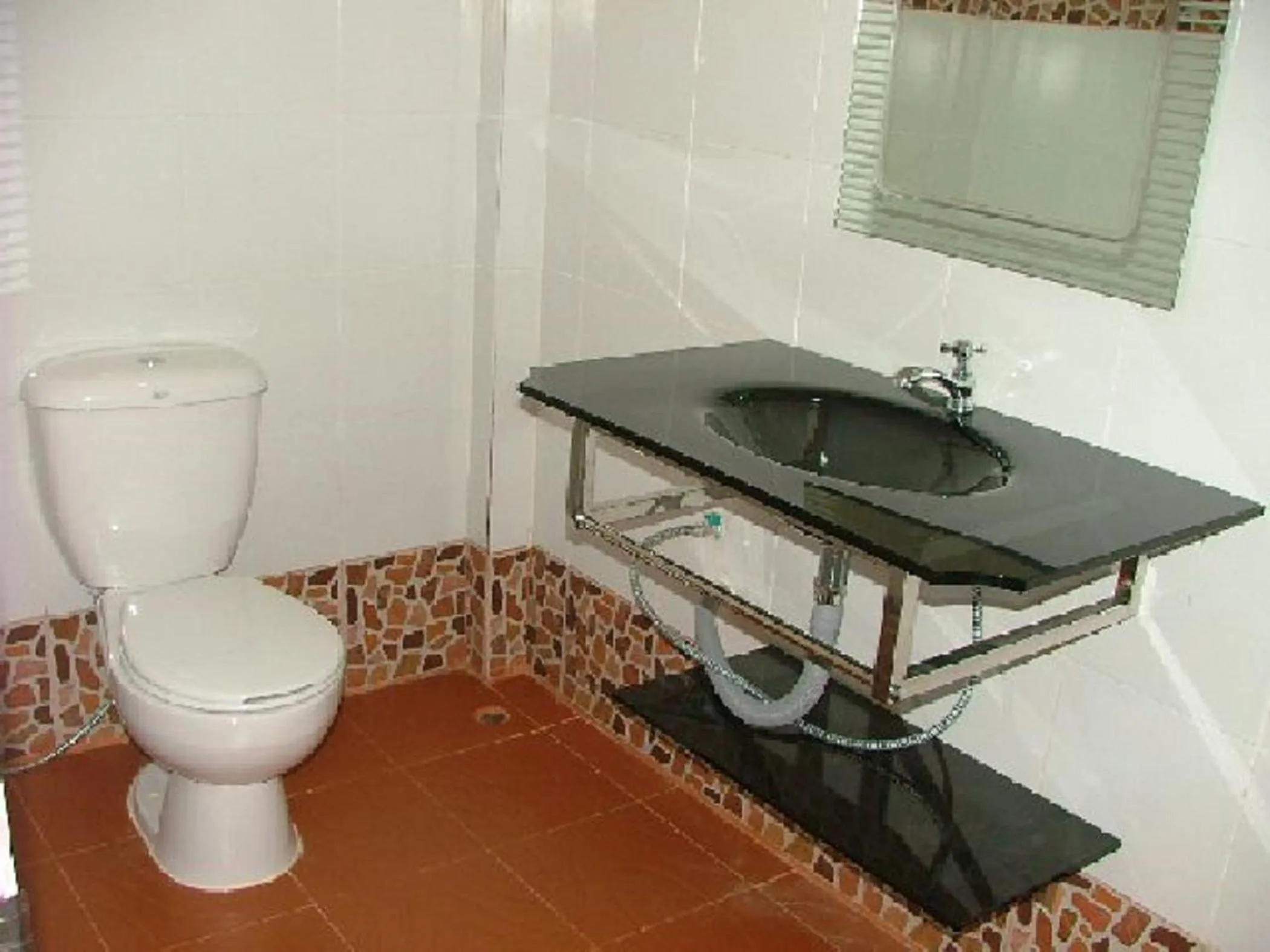 Bathroom in The Siam Guest House - SHA Extra Plus