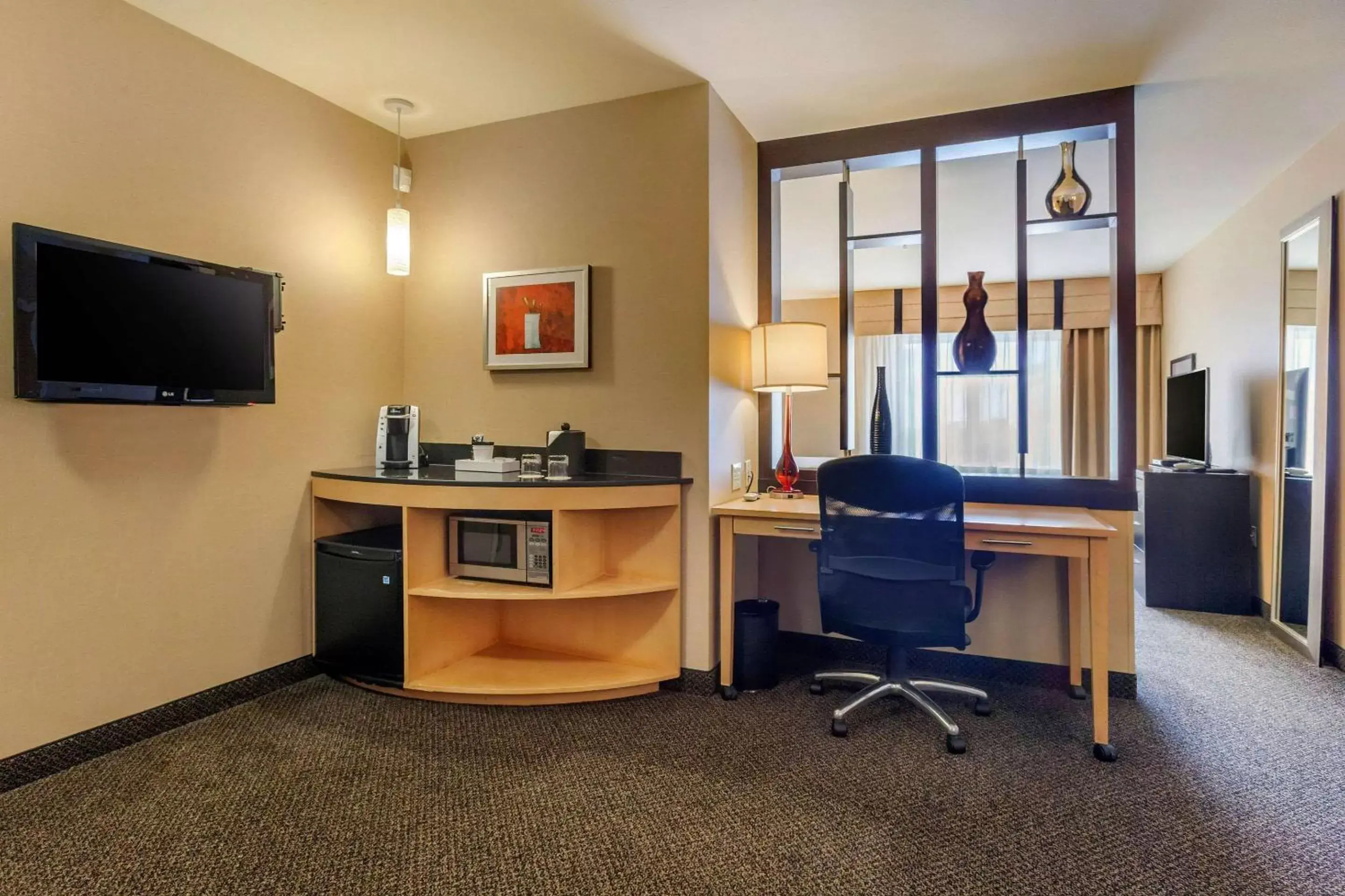 Photo of the whole room, TV/Entertainment Center in Cambria Hotel Ft Collins