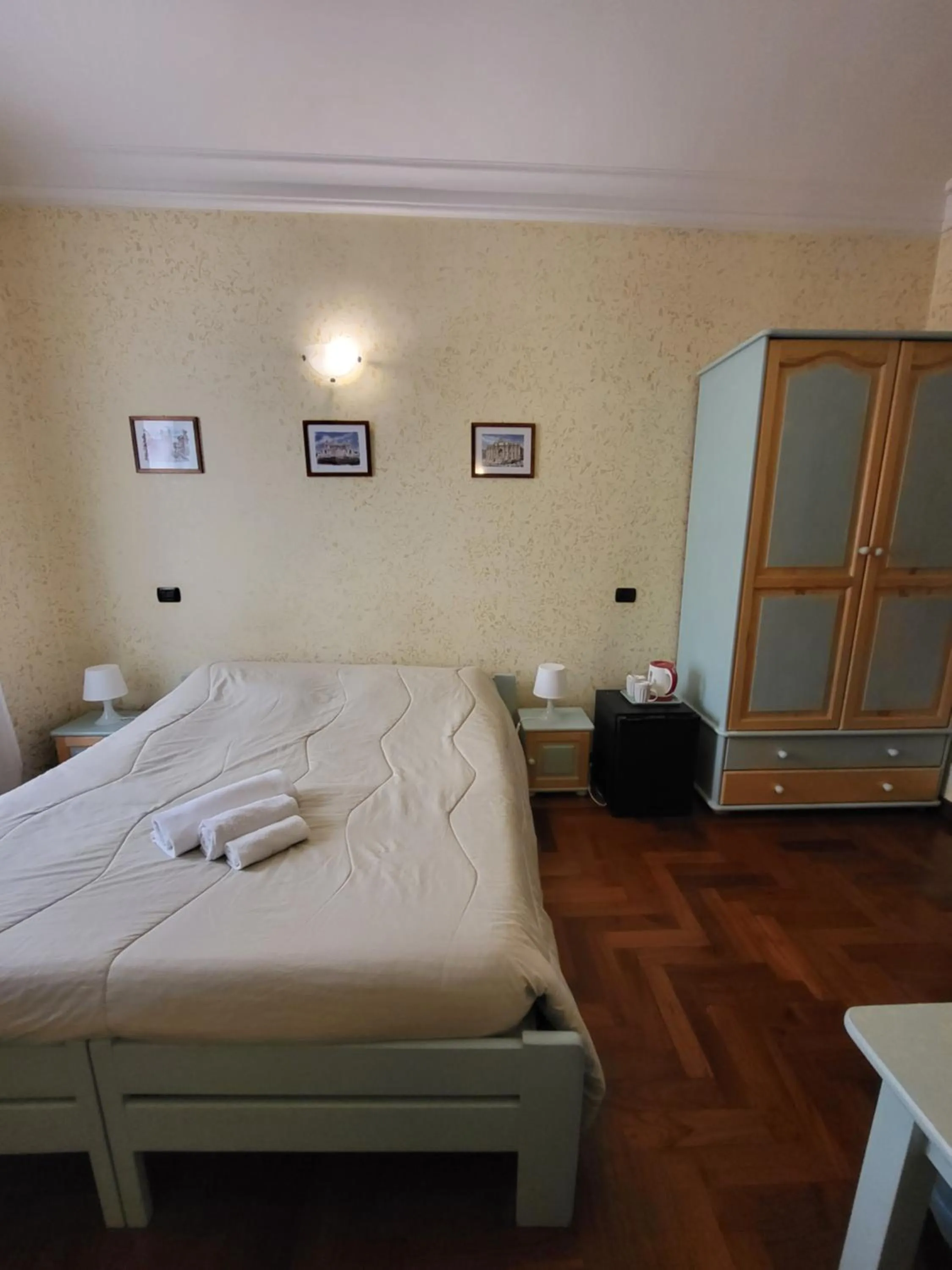 Bed in St. Peter's Rooms Rome