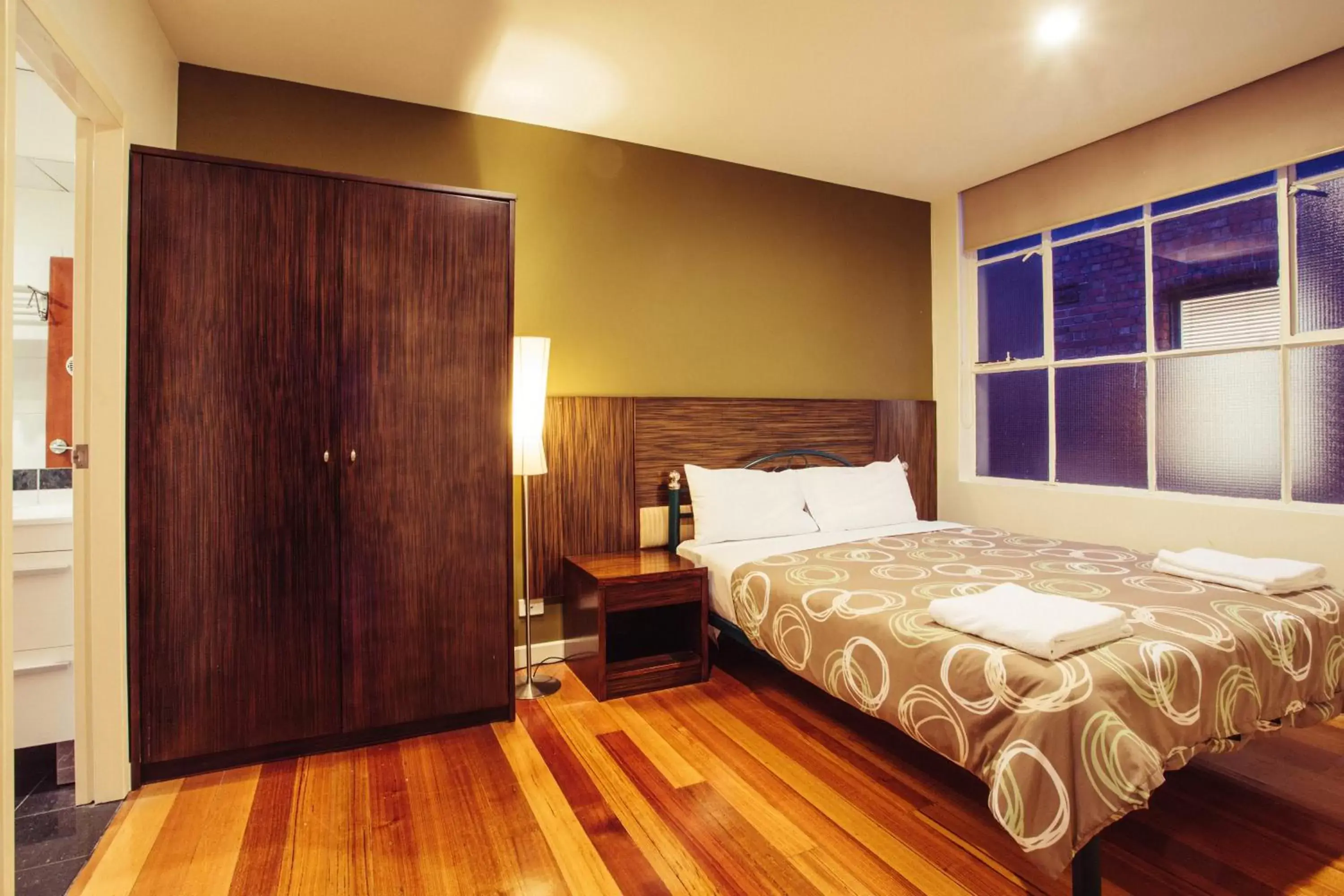 Bedroom, Bed in YTI Garden Hotel