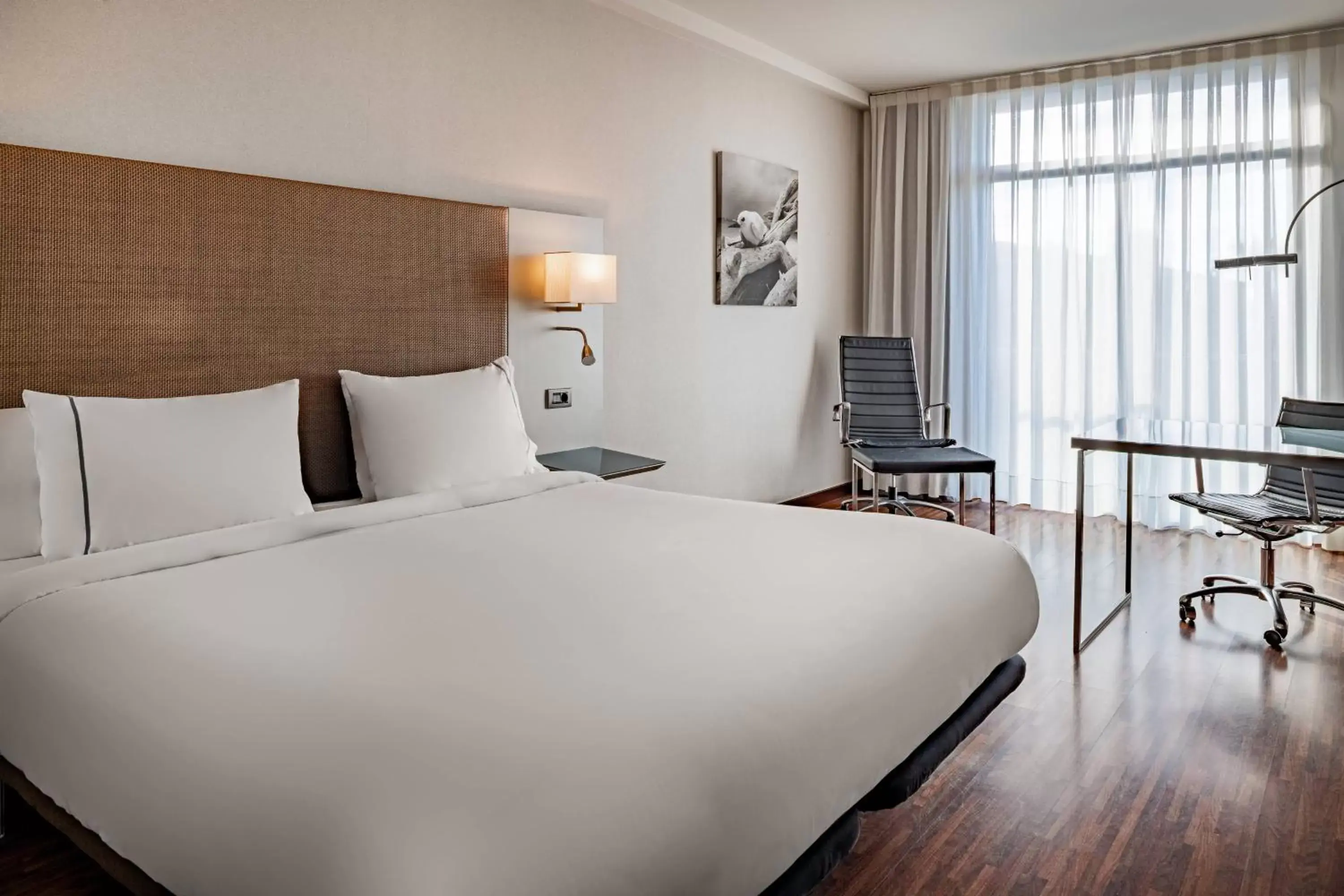 Photo of the whole room, Bed in AC Hotel Gavà Mar Airport by Marriott