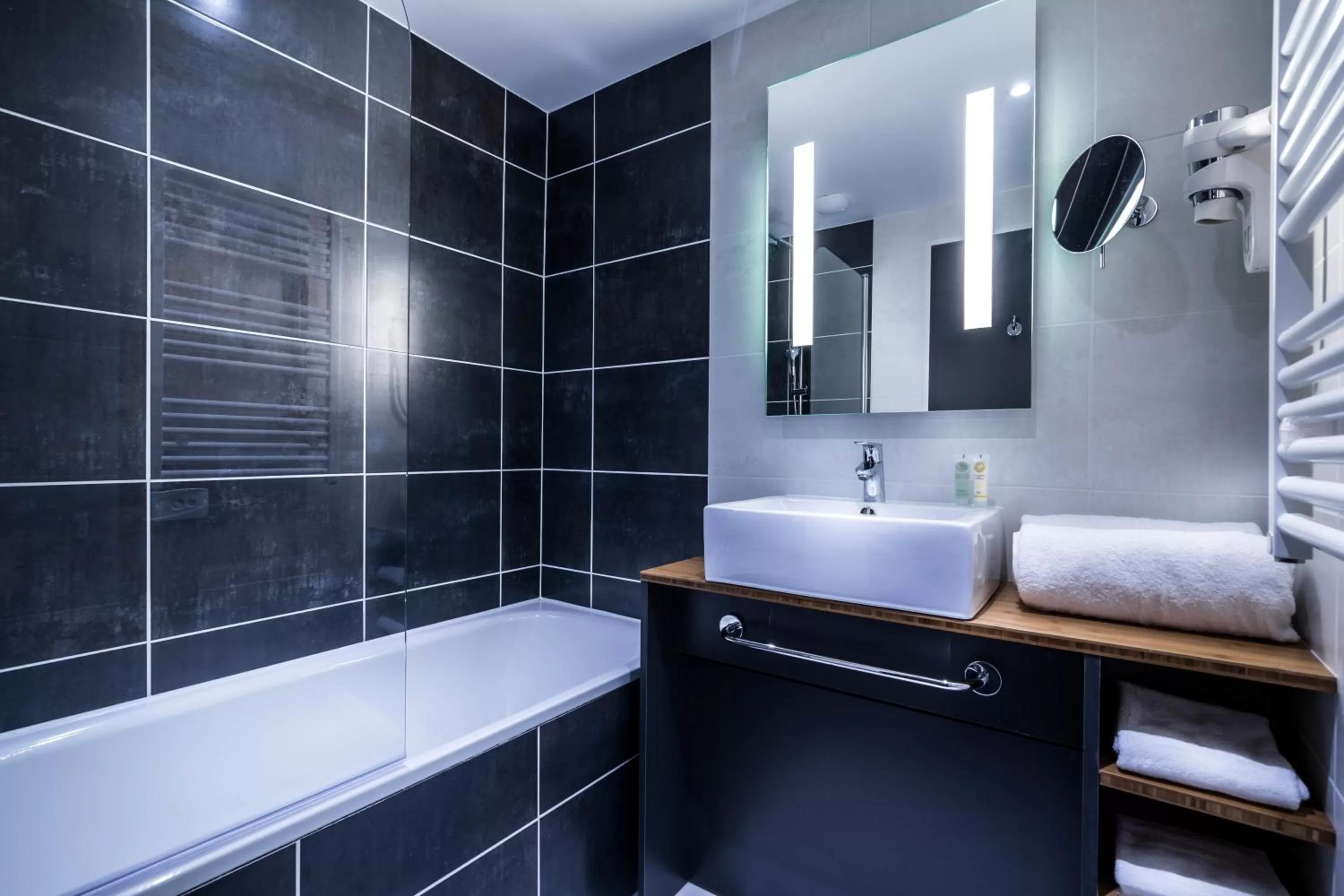 Bathroom in Best Western Plus Suitcase Paris La Défense