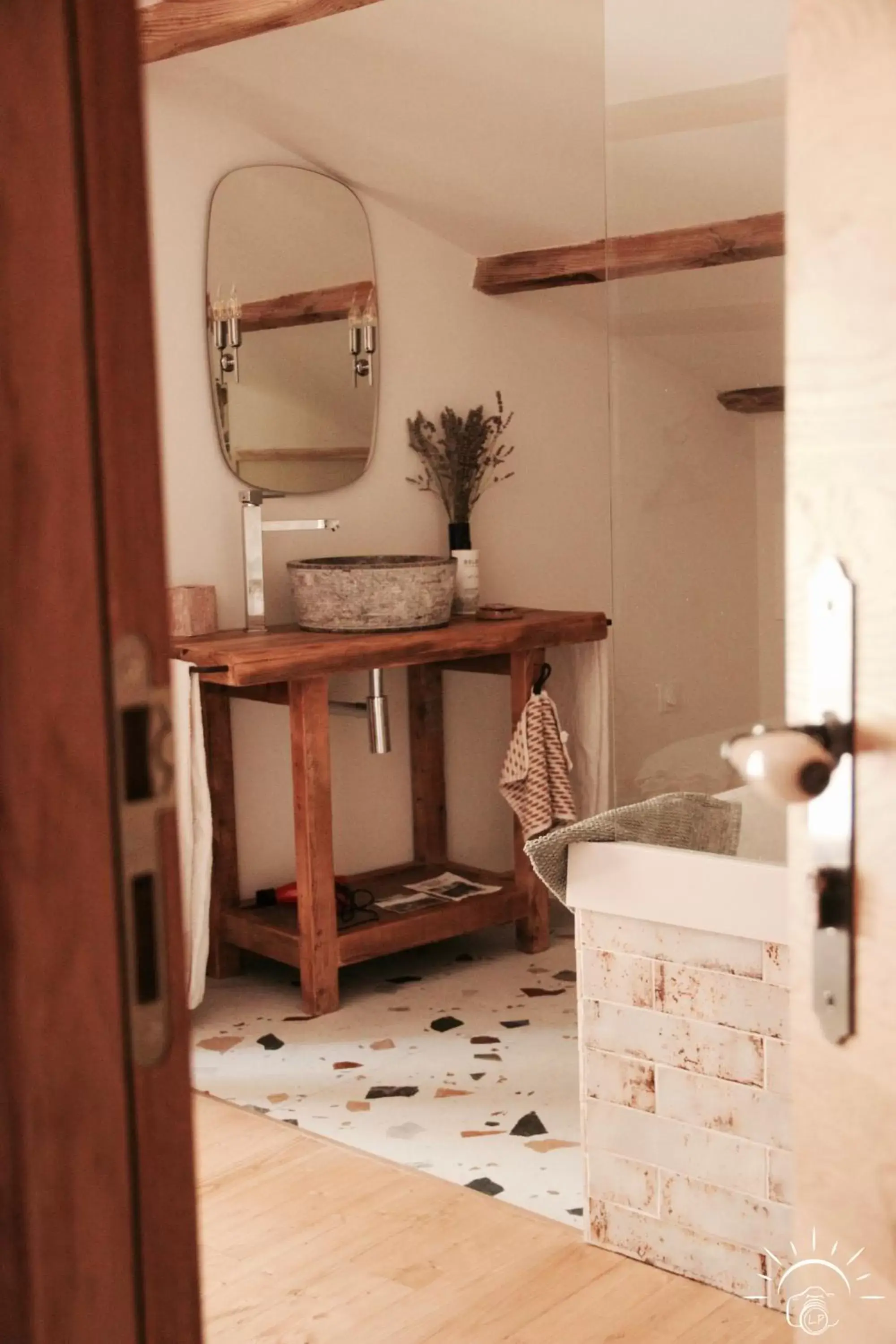 Bathroom in Chambre d'hôtes dans une ancienne bergerie