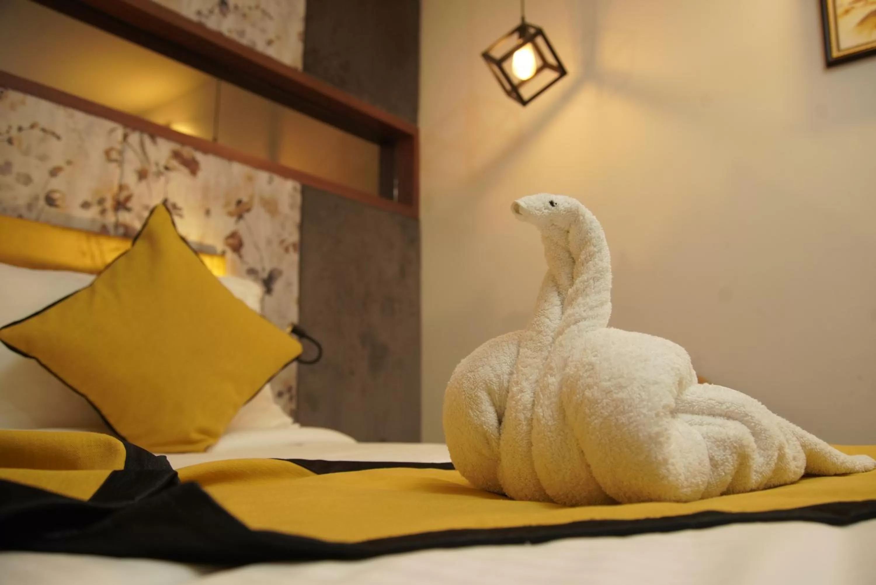 Bed in Hotel Namo Residency