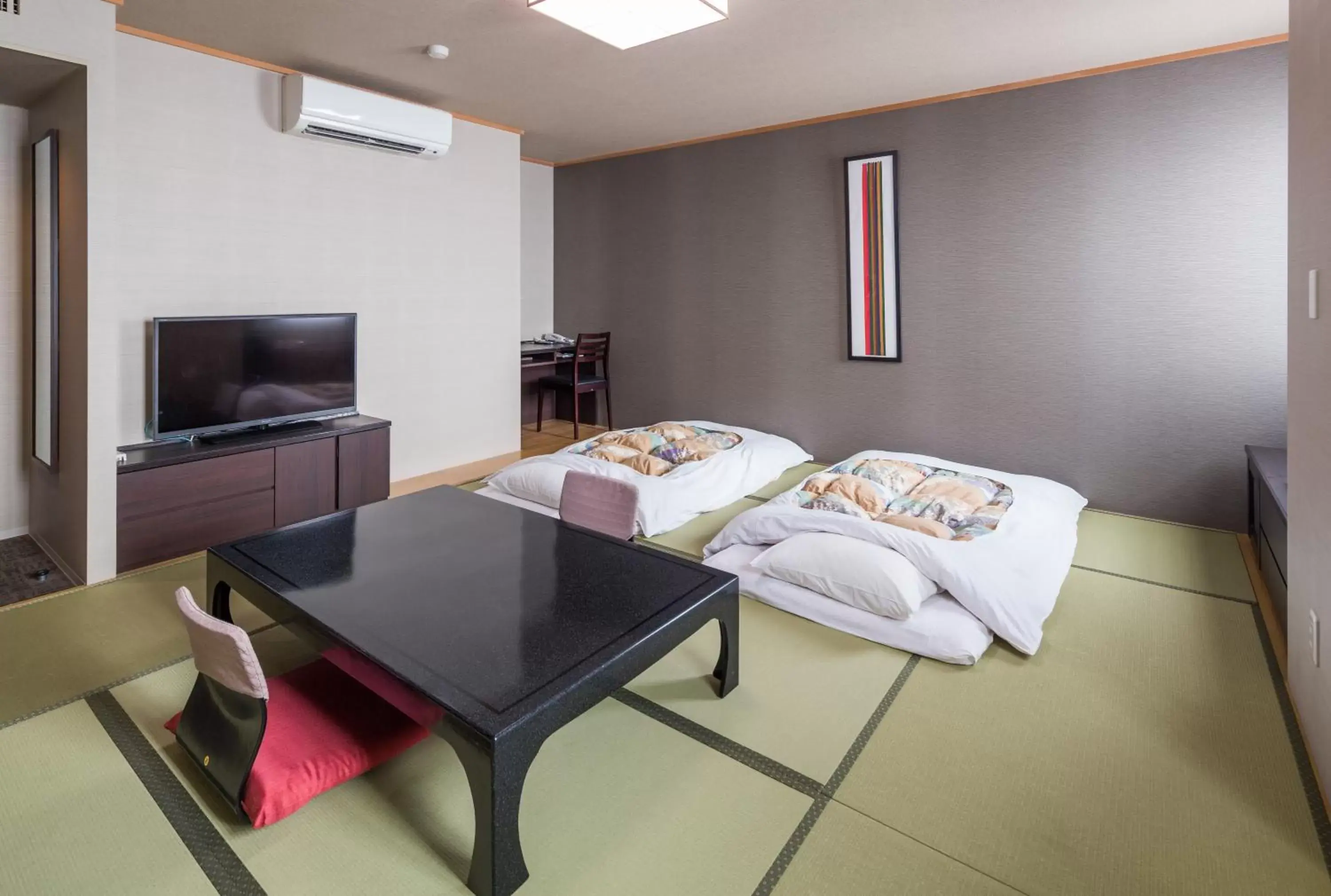Photo of the whole room, TV/Entertainment Center in Hotel Mystays Nayoro
