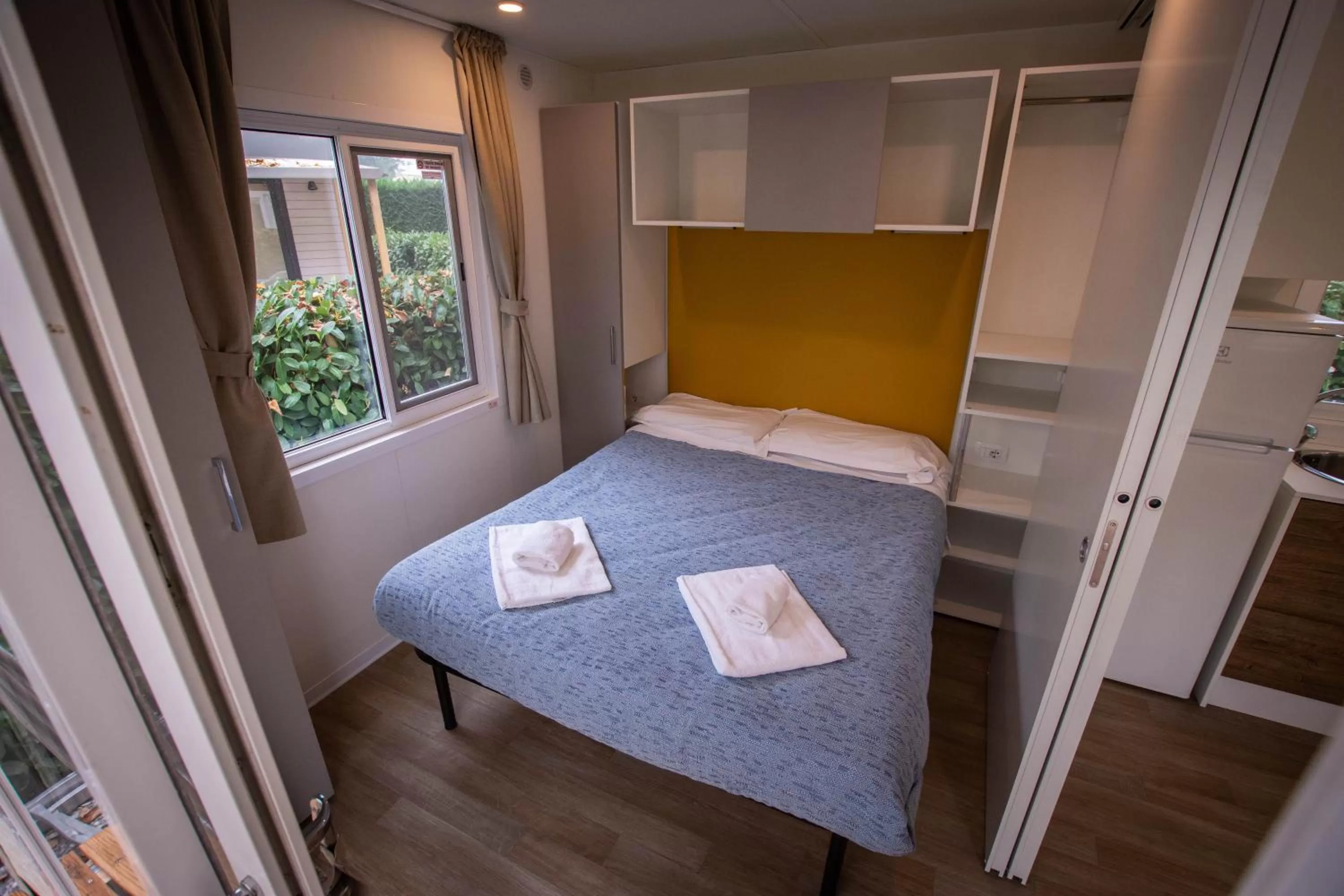 Bed in AgriCamping AlbaVillage Hotel & Wellness