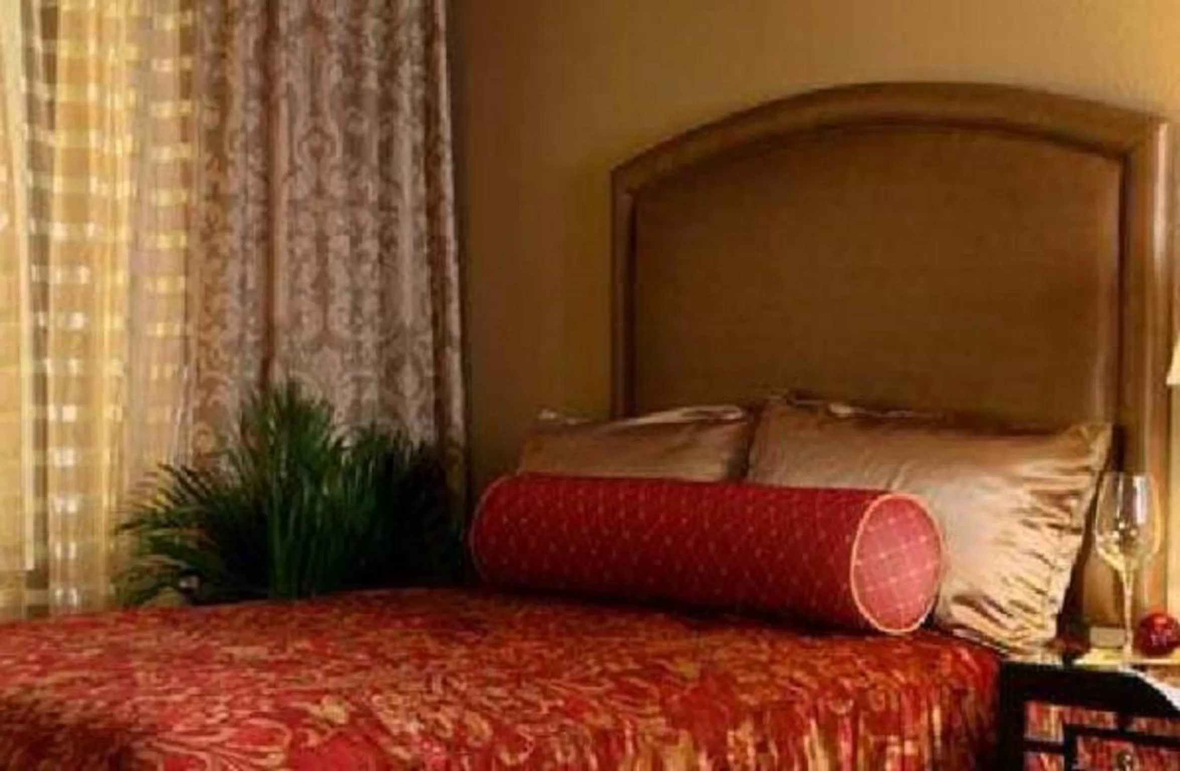 Bed in Jockey Club Suites