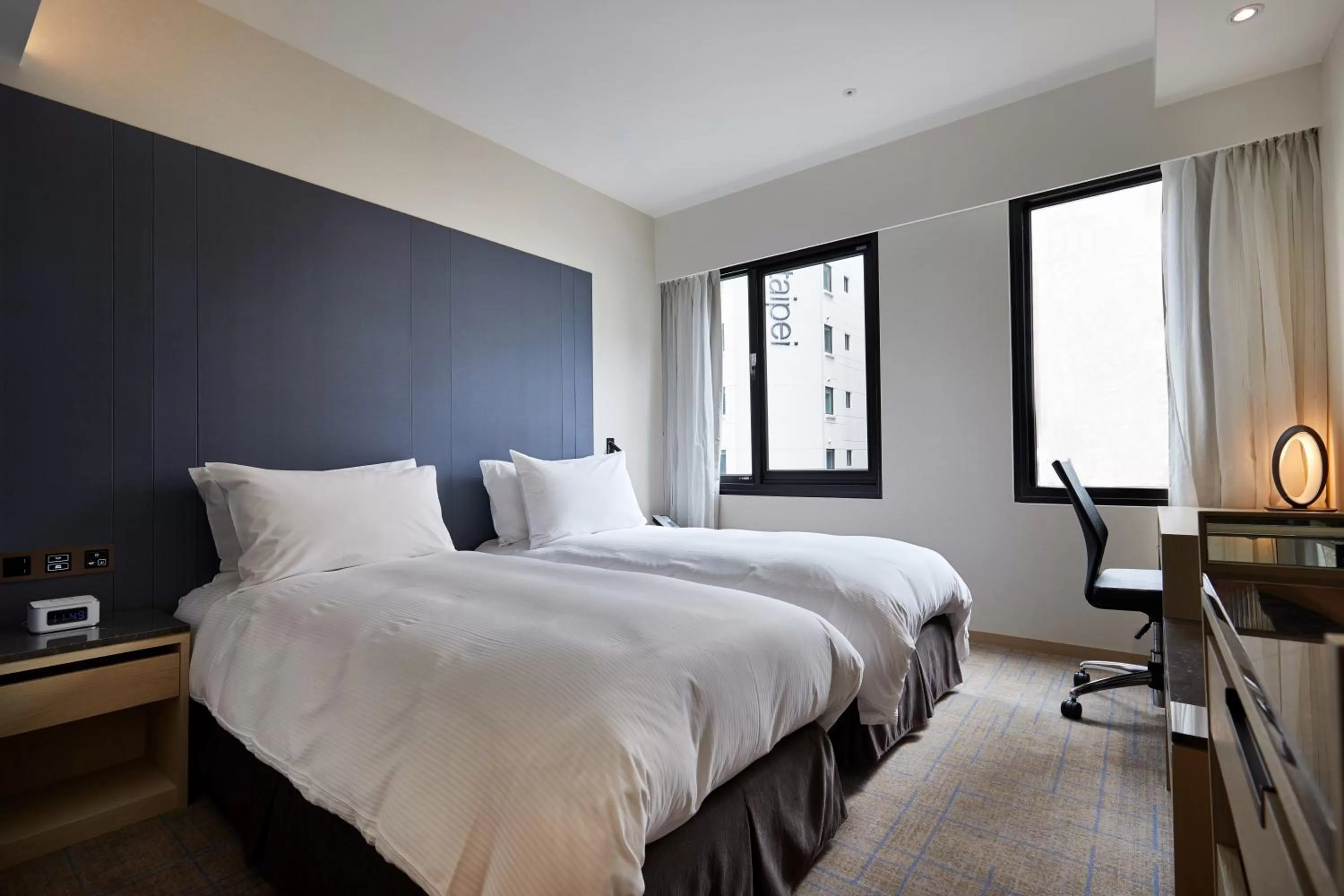 Bed in K Hotels Taipei Linsen