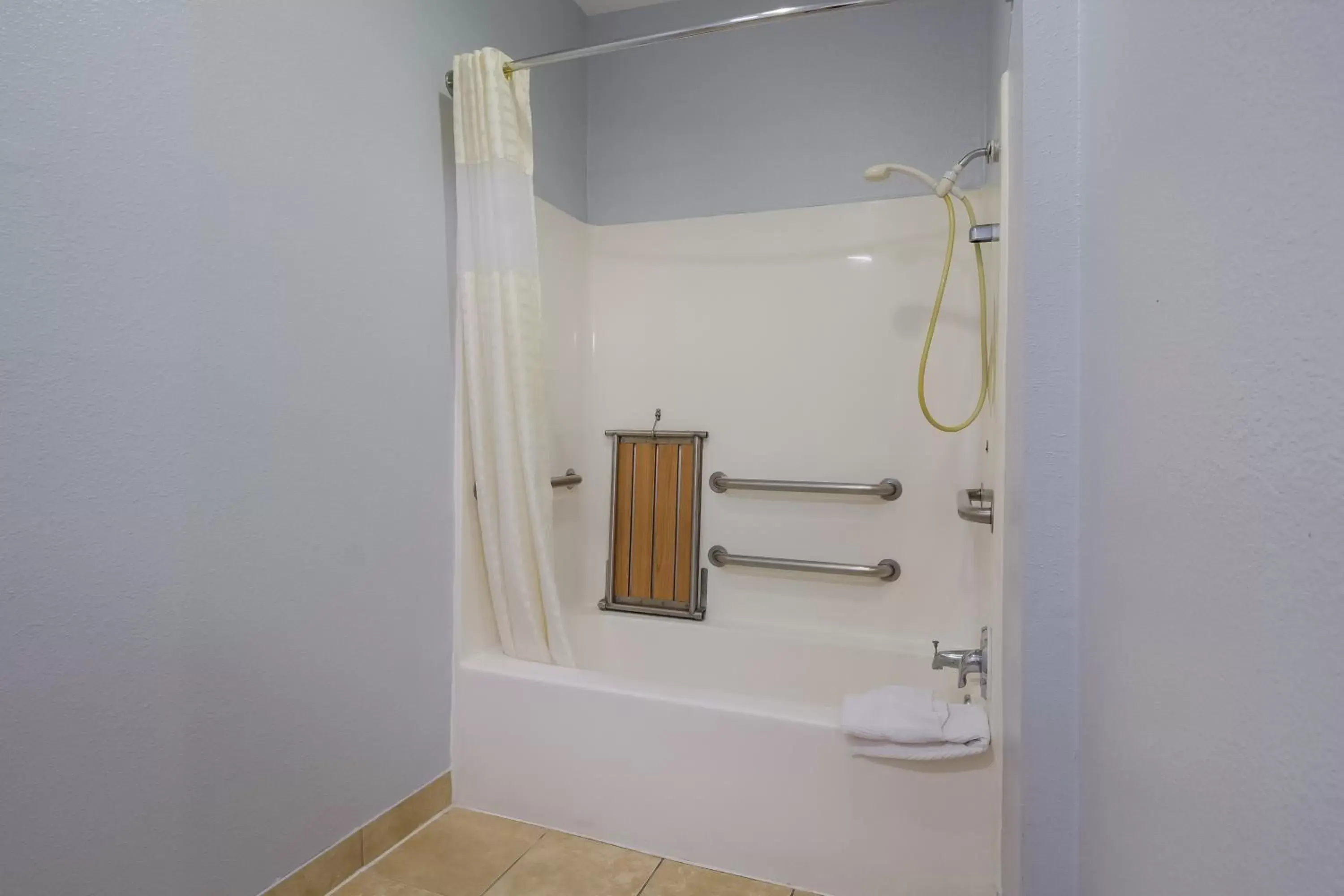 Shower, Bathroom in Scottish Inn & Suites