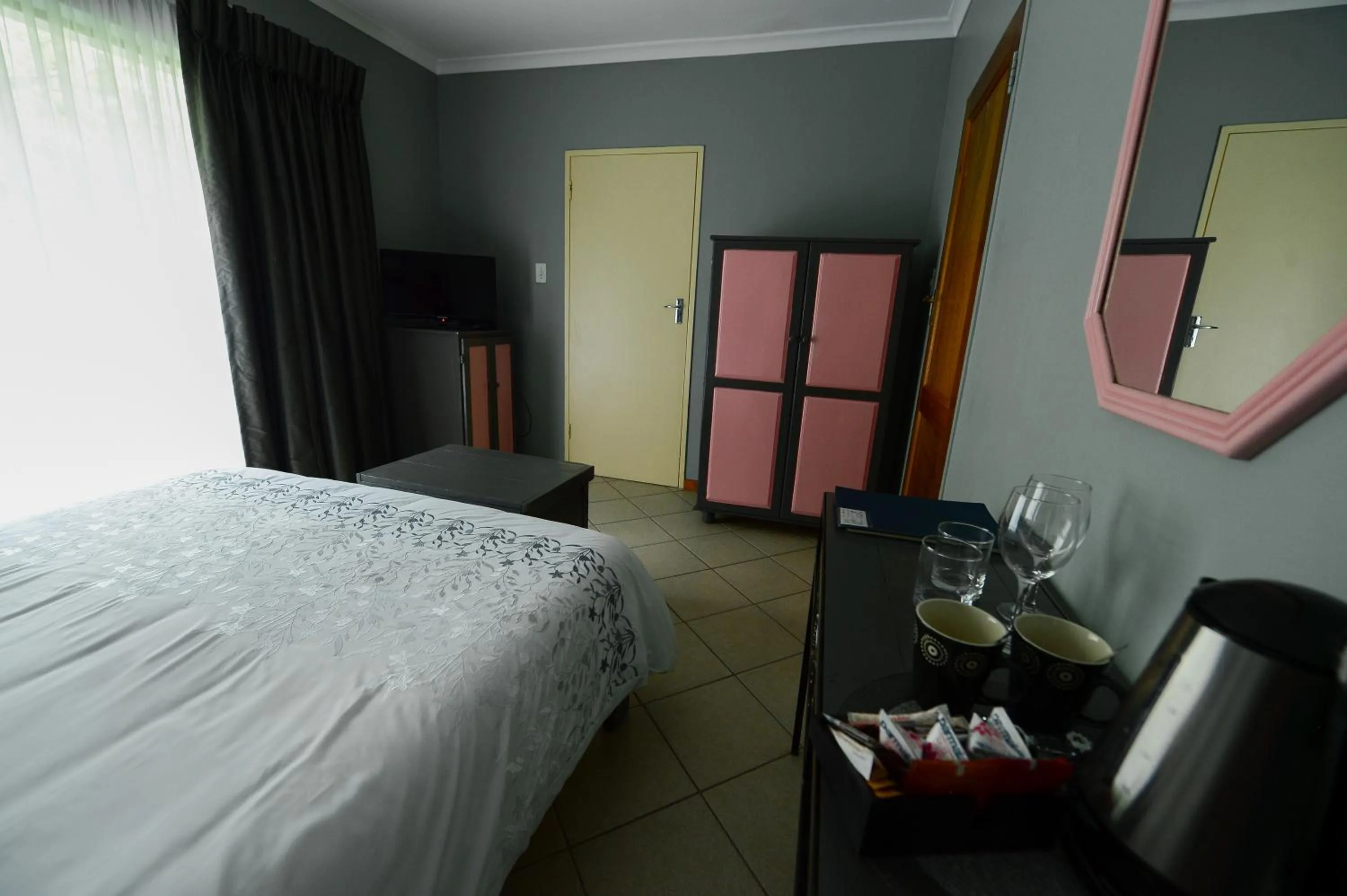 Bed in De Wingerd Wijnland Lodge