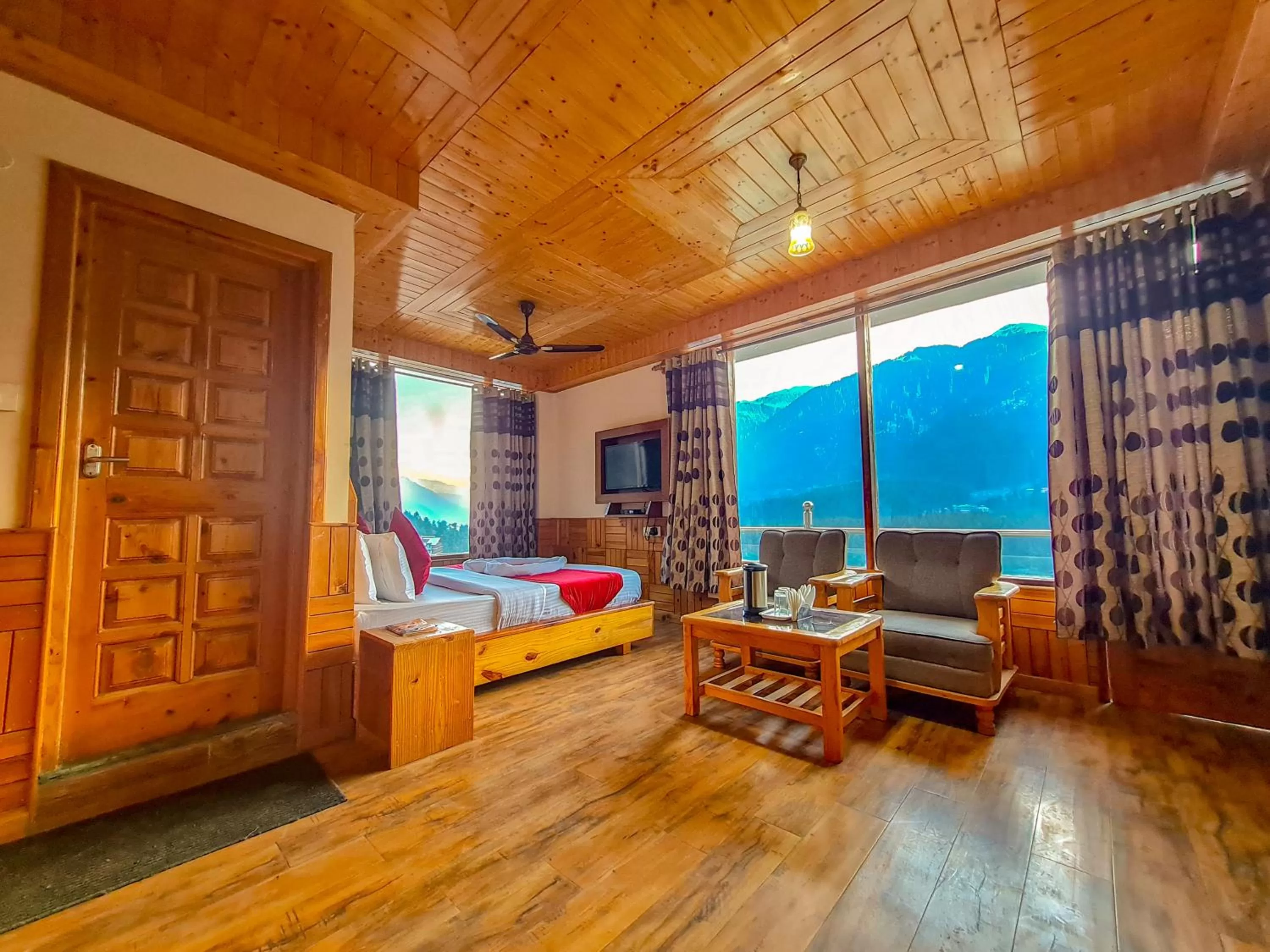 Bed, Seating Area in Namaste Inn Beas Valley