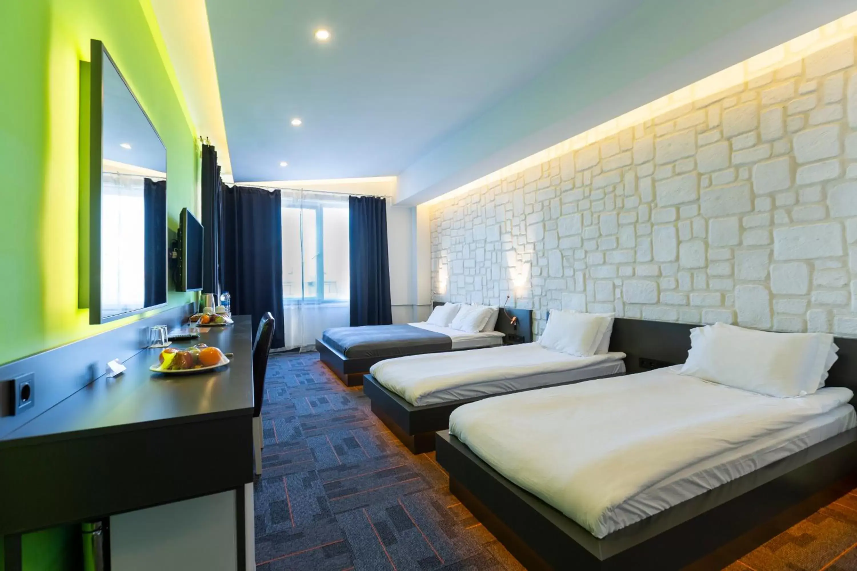 Bed in Mene City Hotel