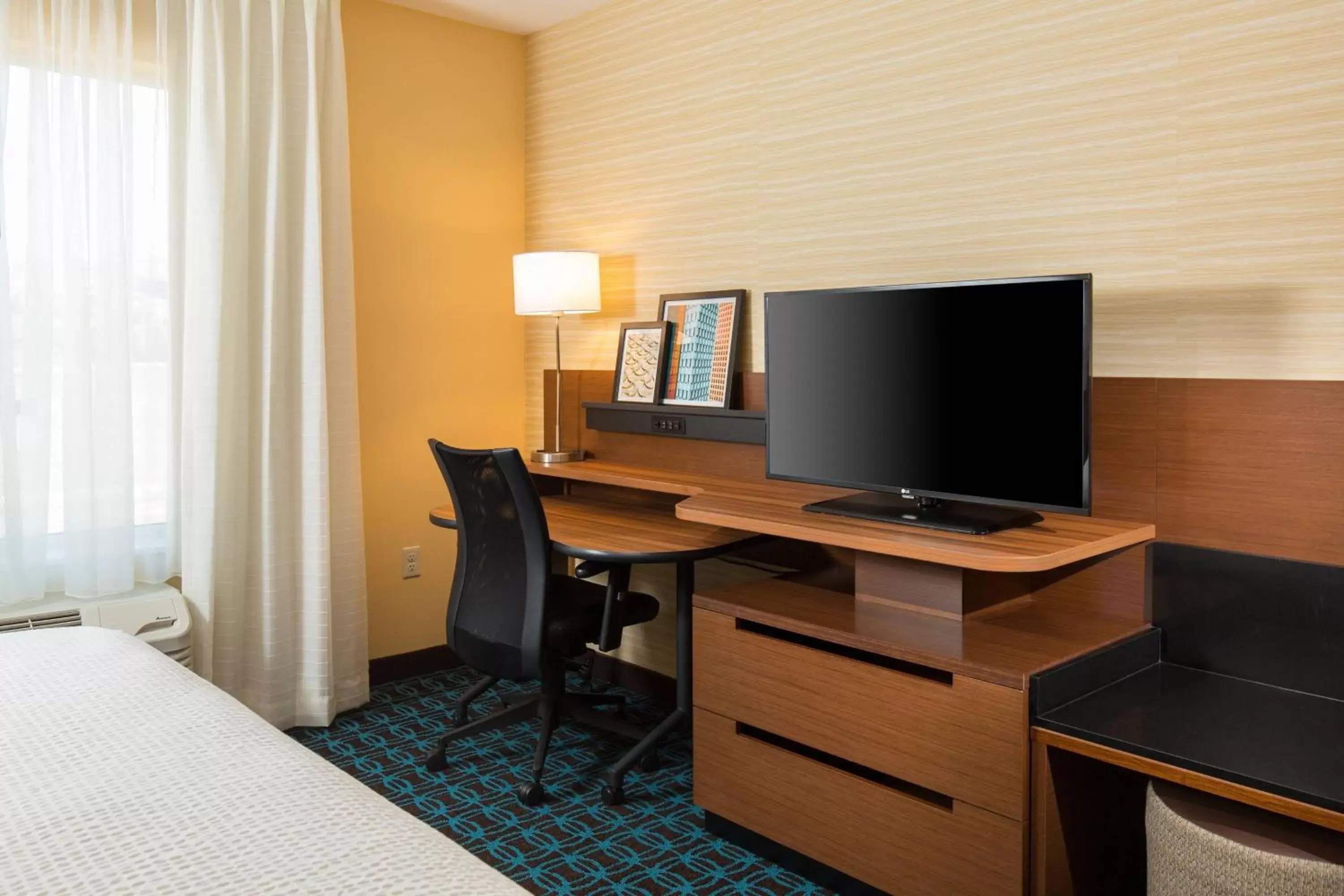 Photo of the whole room, TV/Entertainment Center in Fairfield Inn & Suites by Marriott Sacramento Folsom