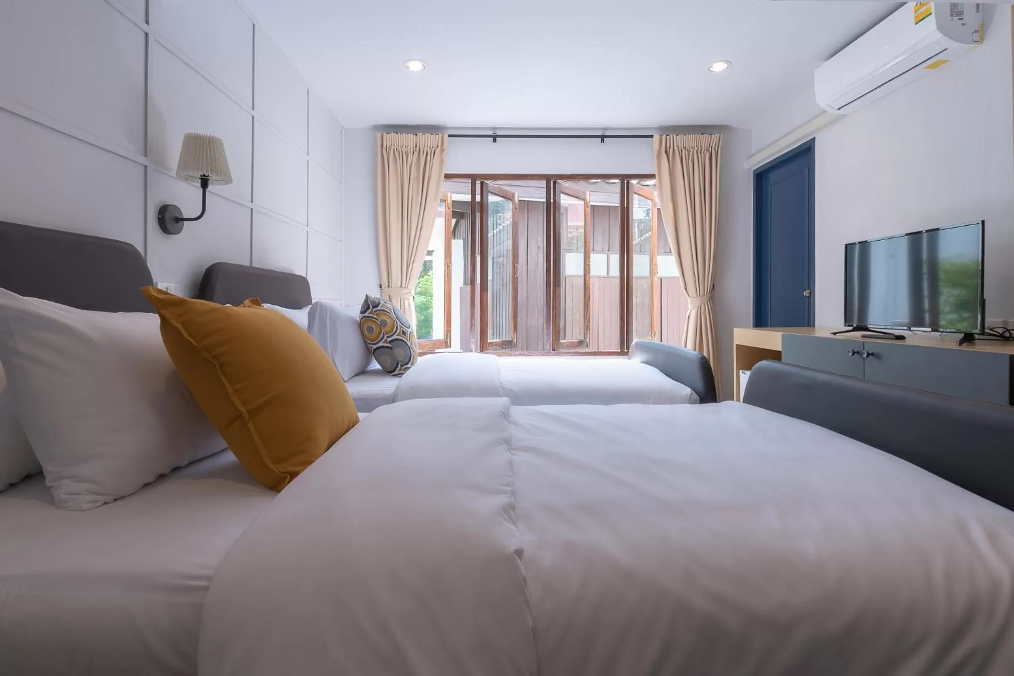 Bed in The Mellow Pillow Hotel @ Chiang Mai Gate