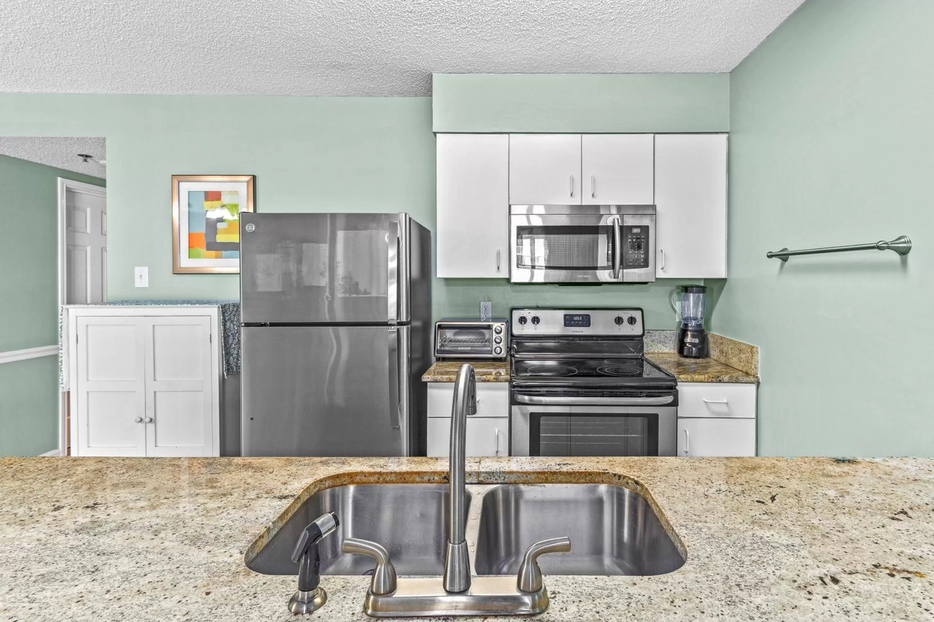 Kitchen or kitchenette in Tradewinds Unit 406