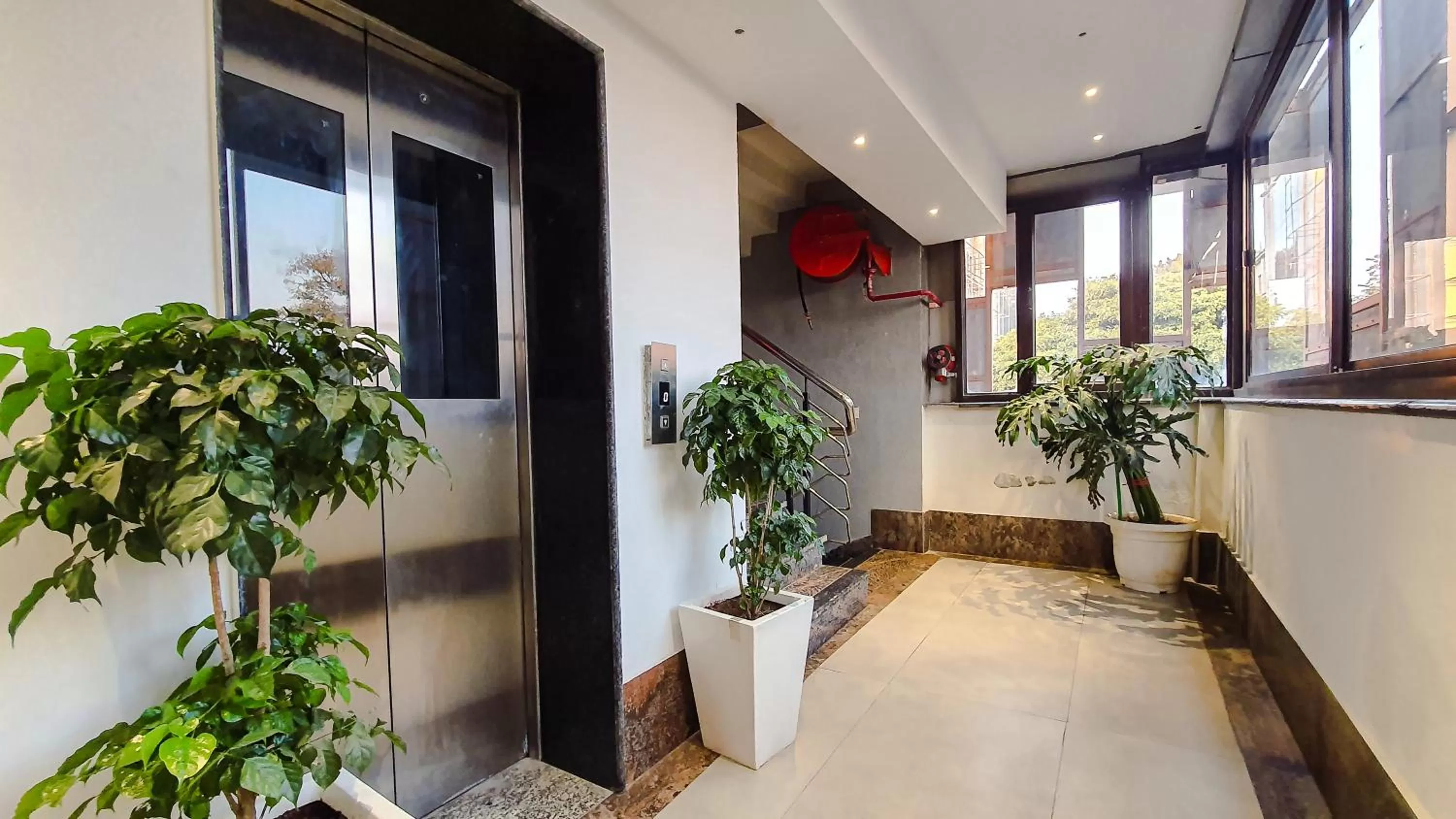 elevator in Aura Rooms