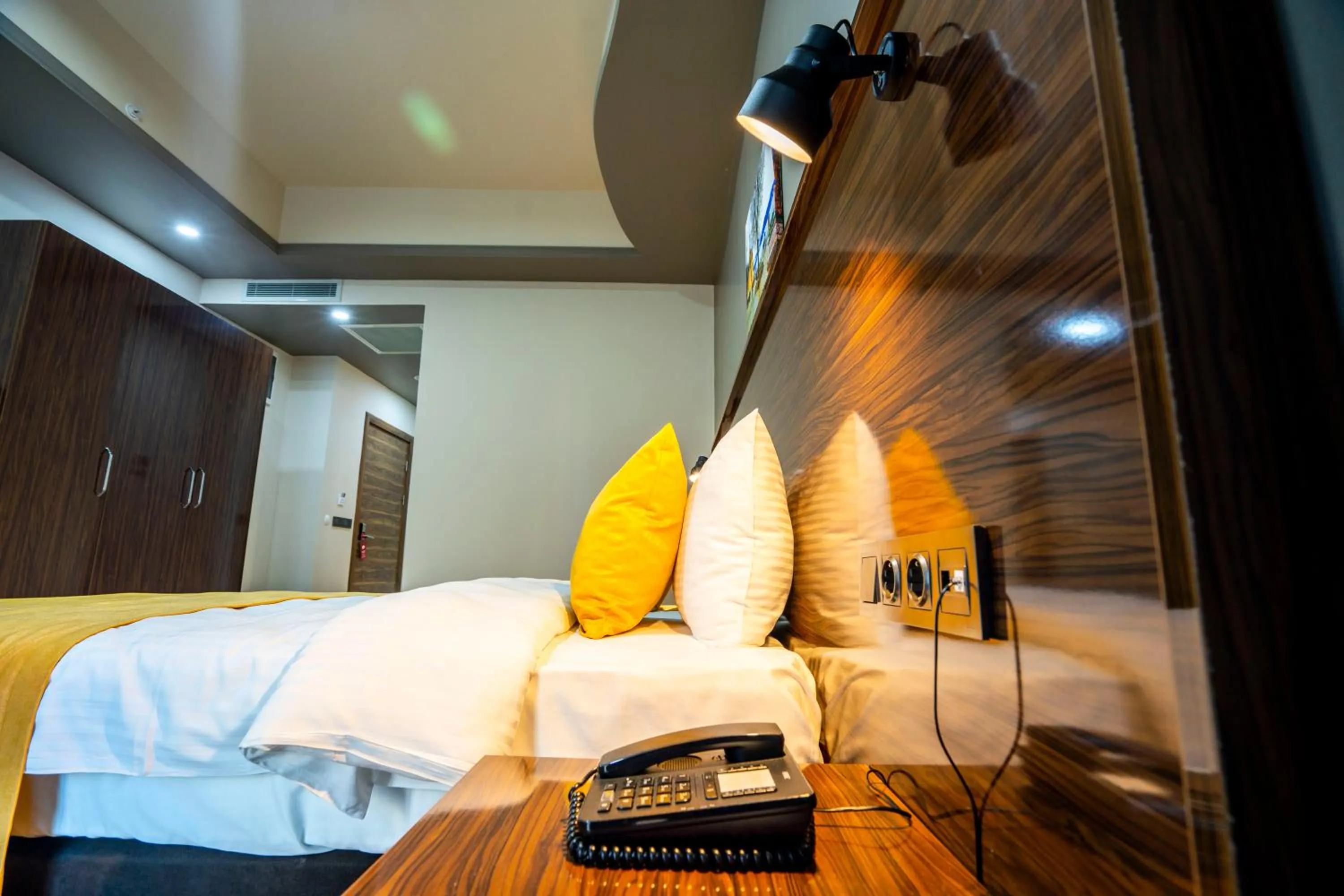 Bed in Mugwort Hotel & Spa