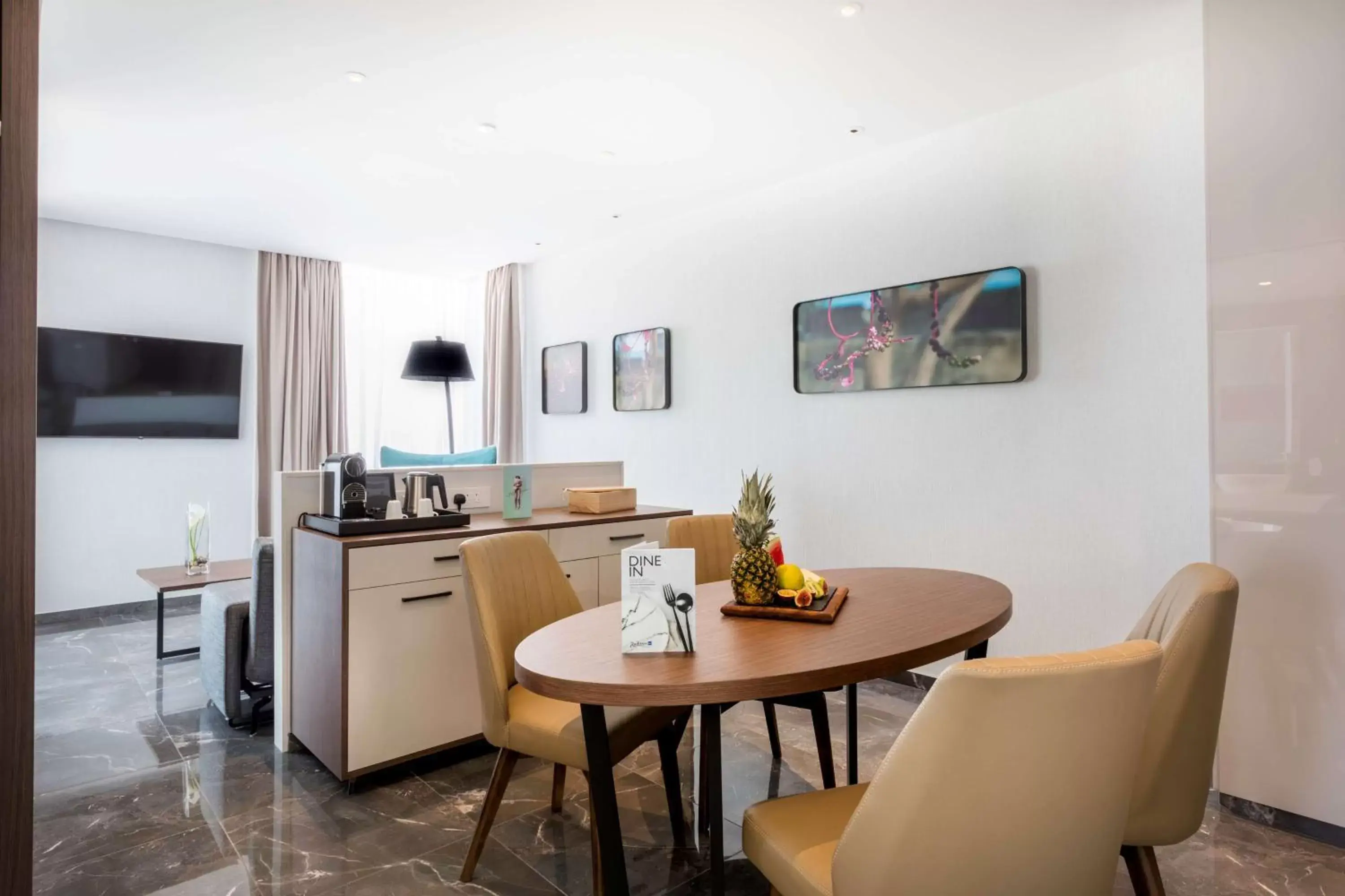 Photo of the whole room, Dining Area in Radisson Blu Hotel, Larnaca