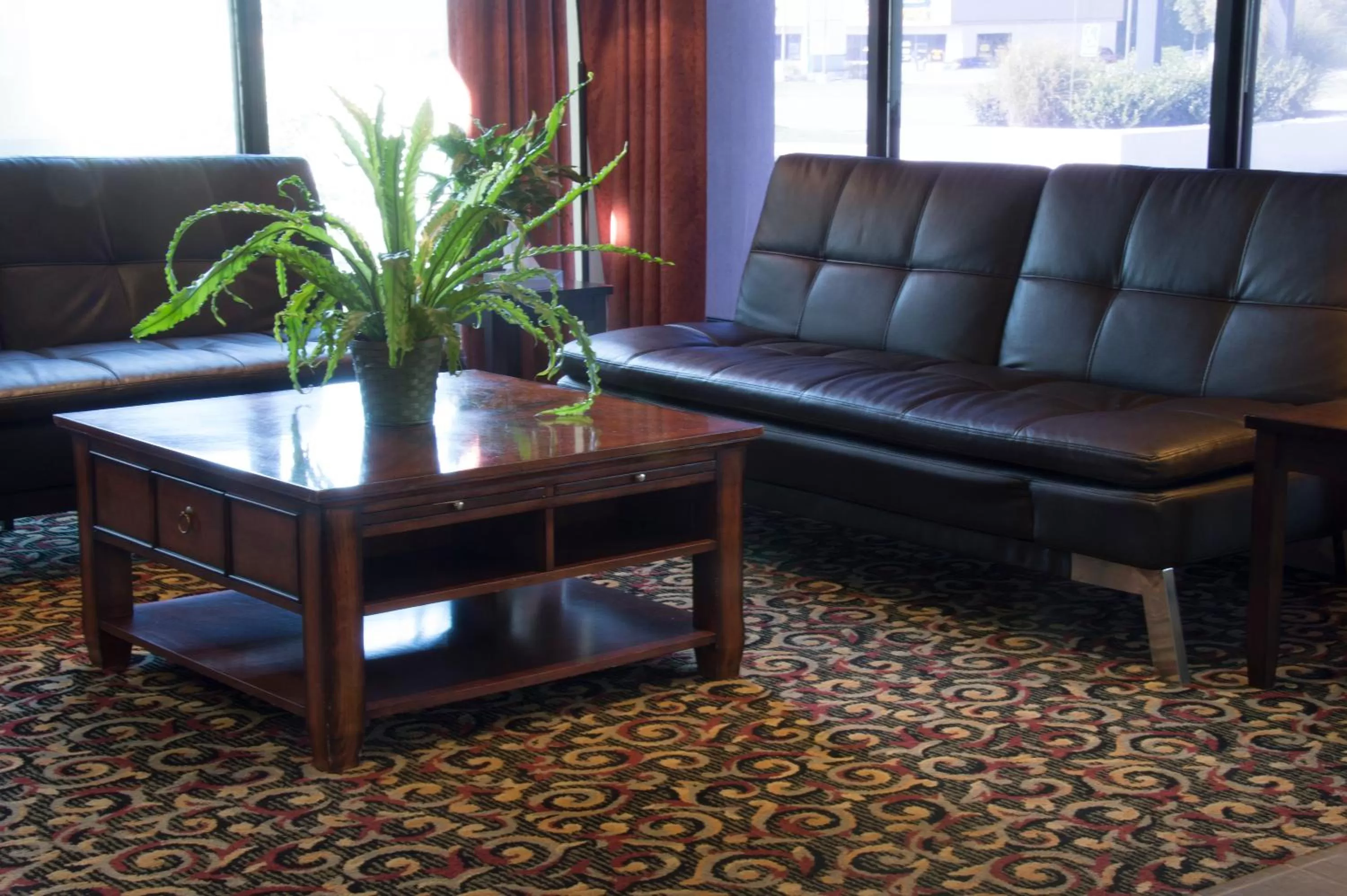 Seating area in Days Inn by Wyndham Pittsburg KS