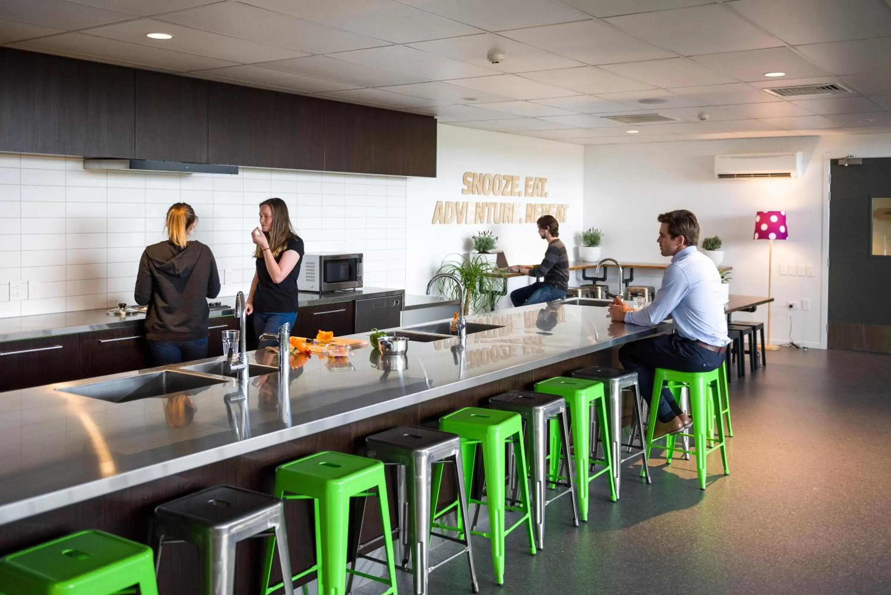 Seating area in Jucy Snooze Christchurch Airport