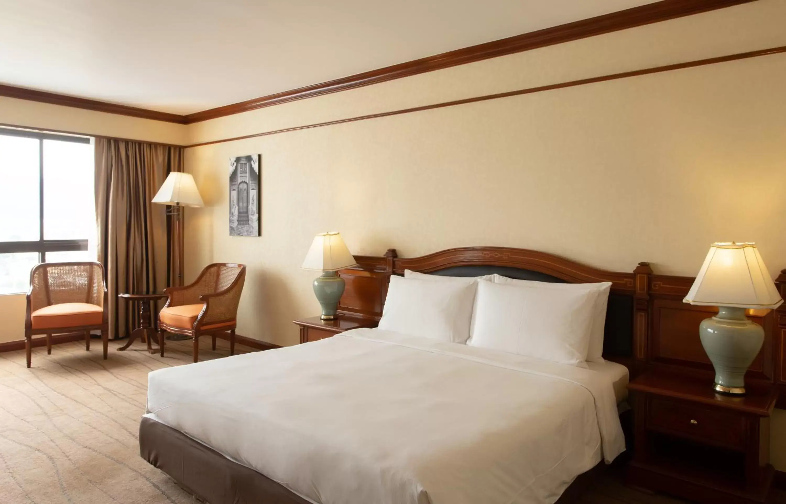 Bed in Centara Riverside Hotel Chiang Mai