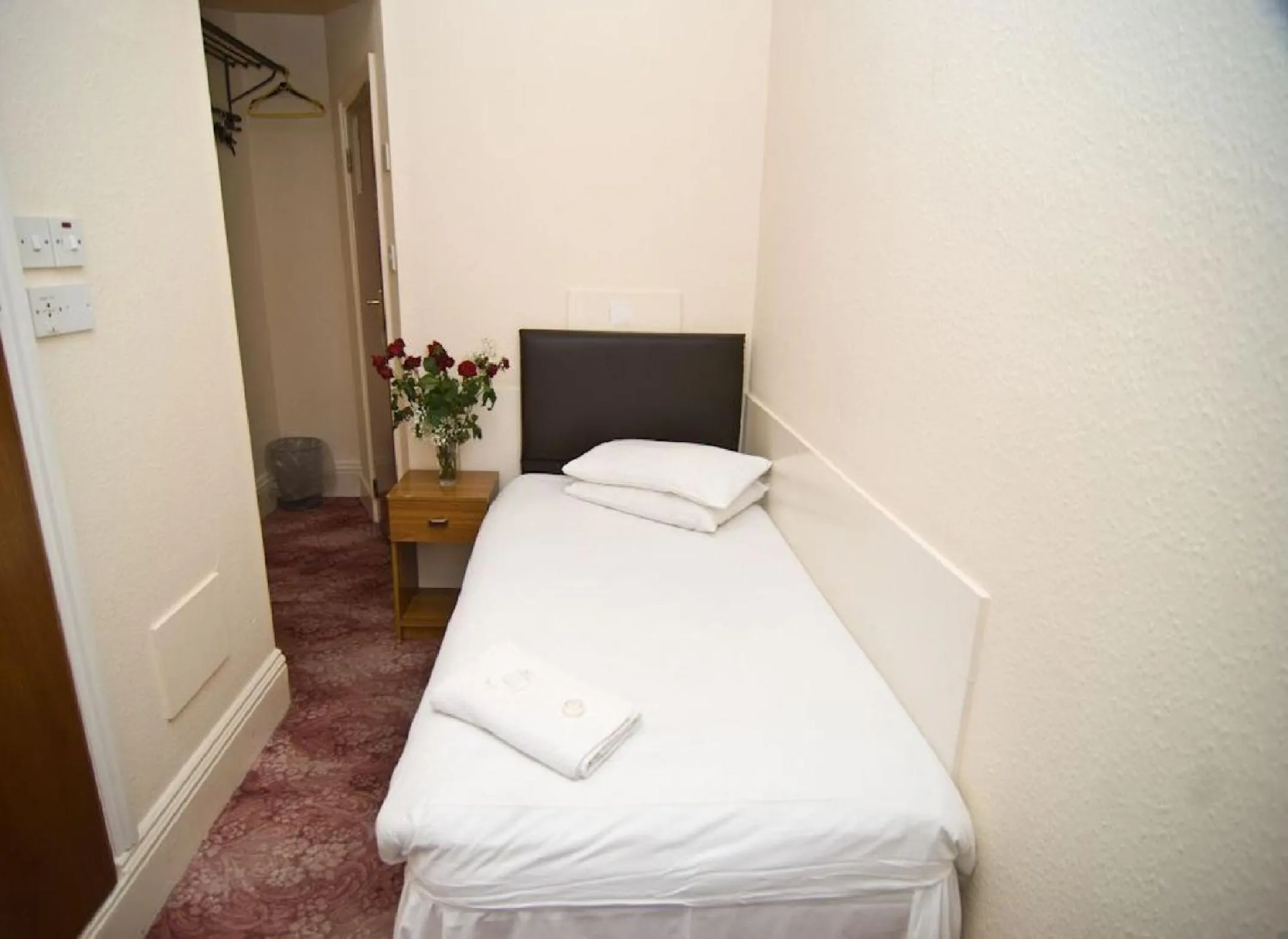 Bed in Charlie Hotel