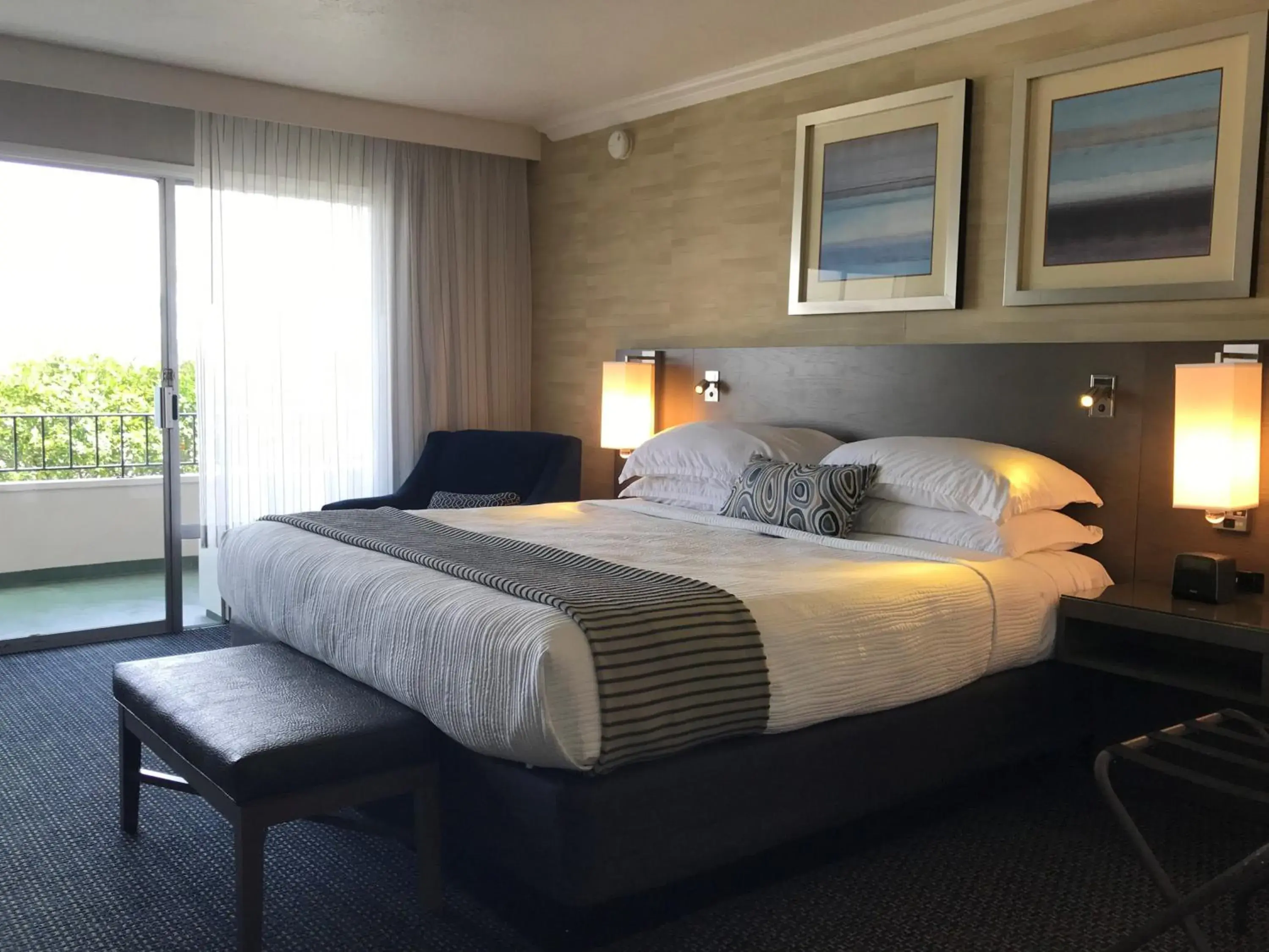 Bed in West Beach Inn, a Coast Hotel