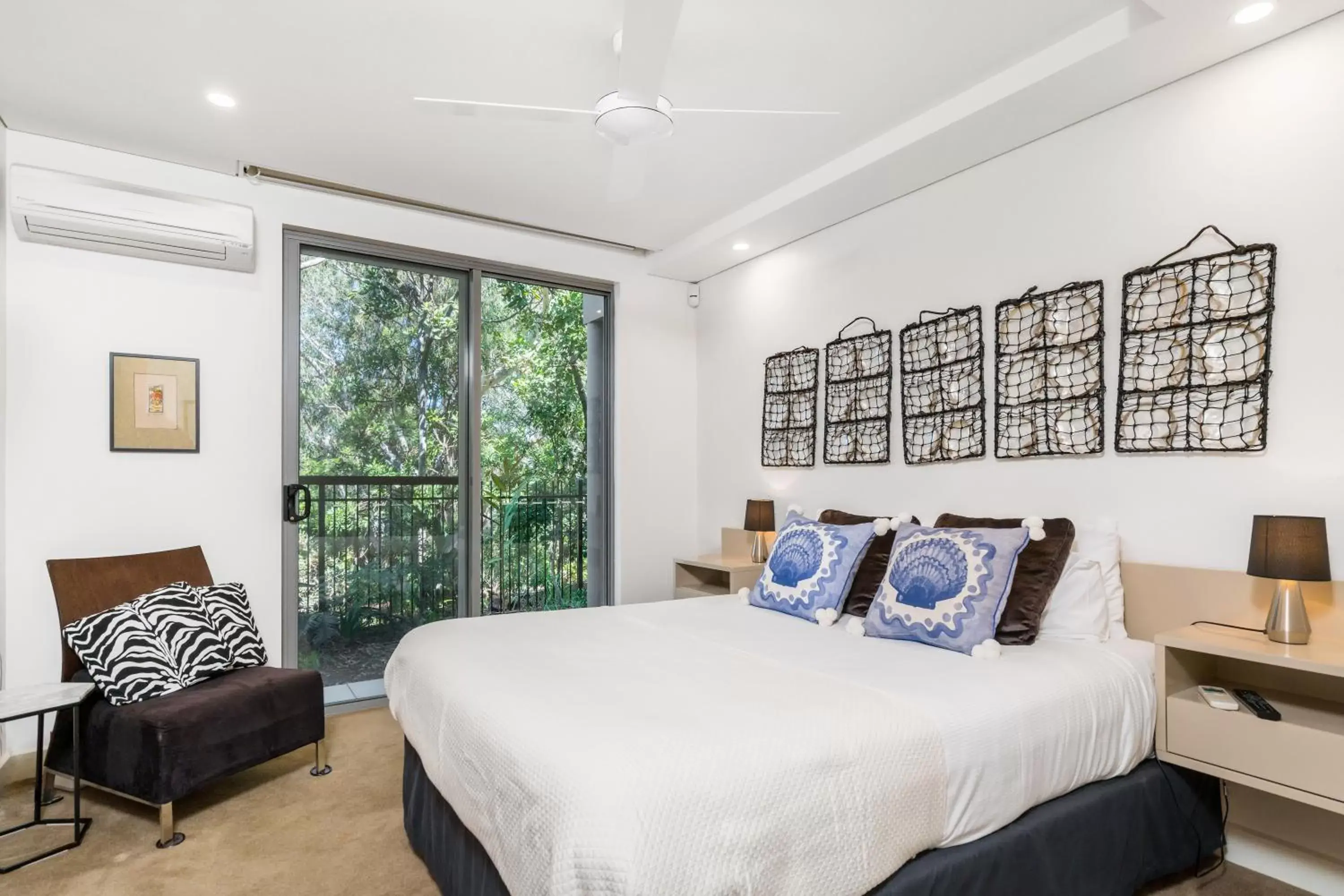 Bedroom, Bed in The Oasis Apartments and Treetop Houses