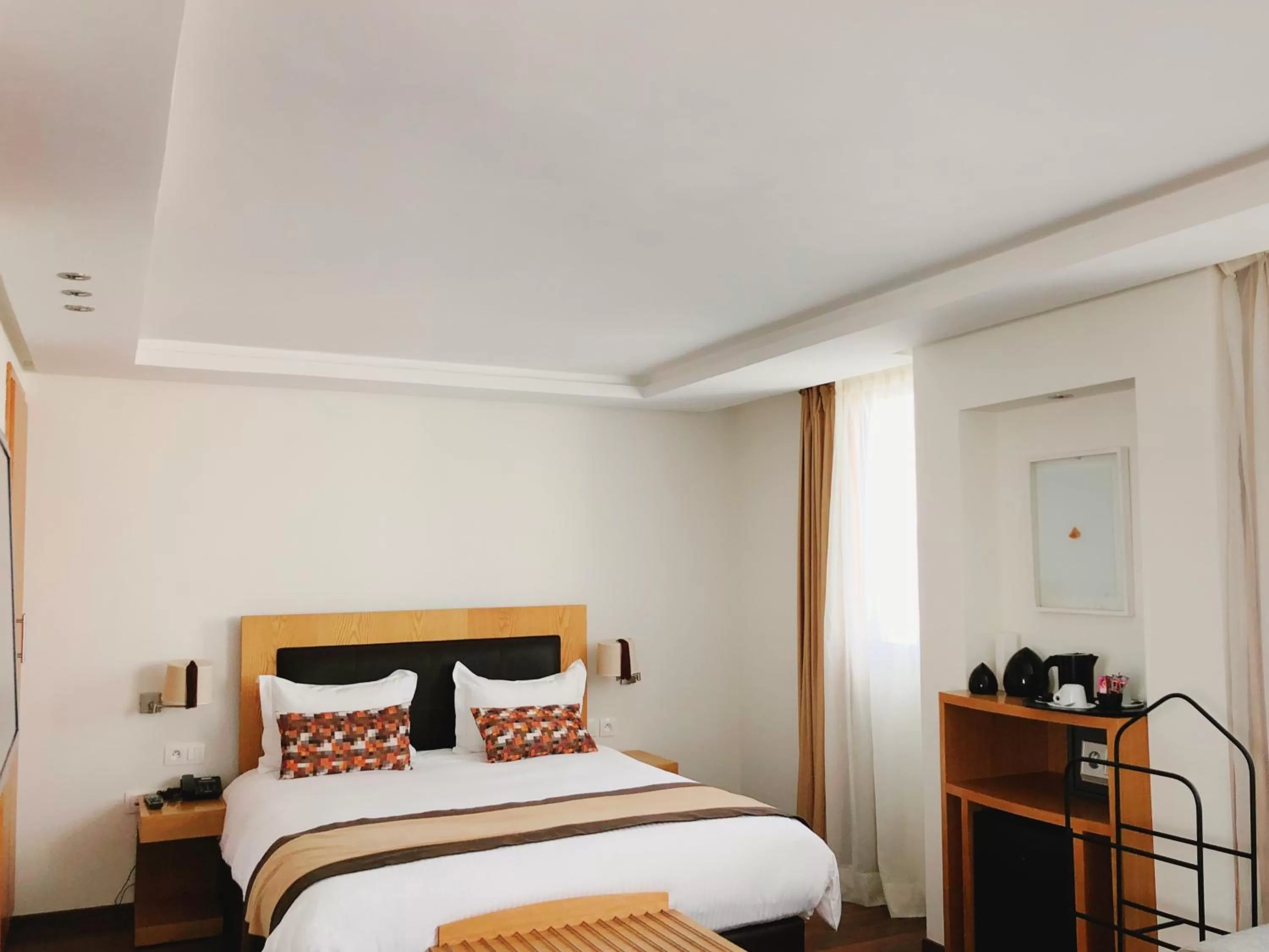 Bed in Le Pietri Urban Hotel