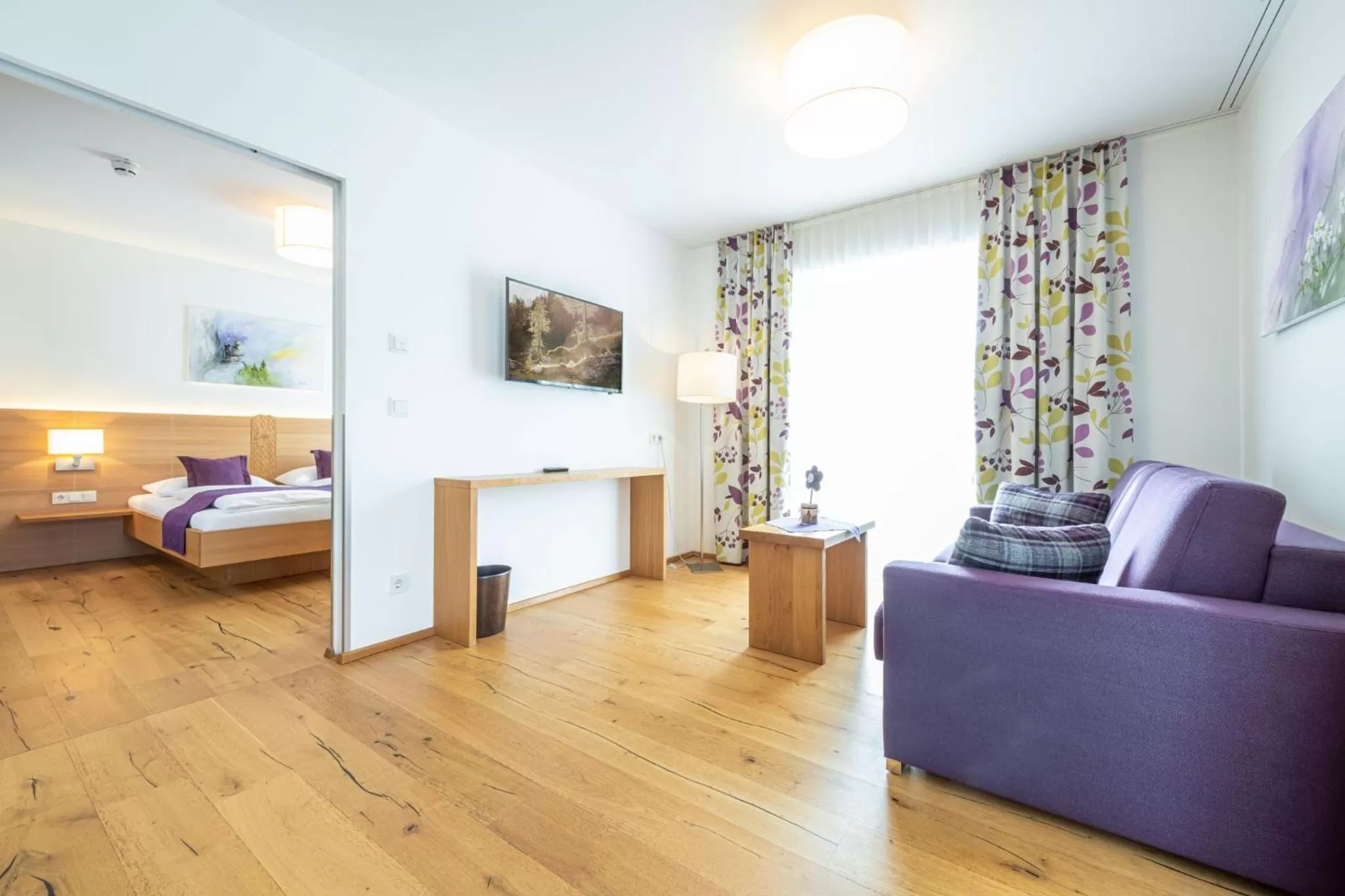 Living room, Bed in Hotel Loy