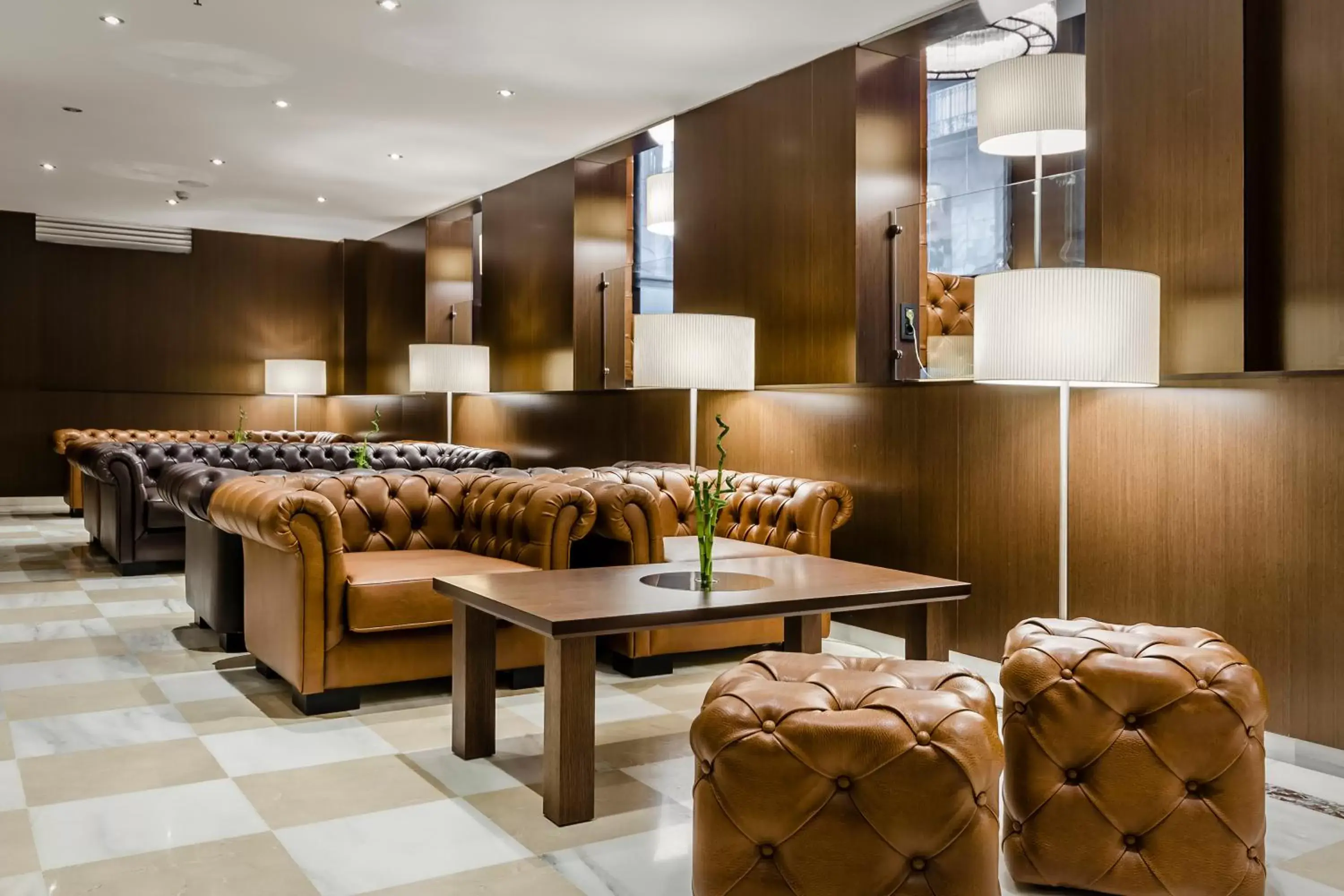 Communal lounge/ TV room in Gran Hotel Barcino