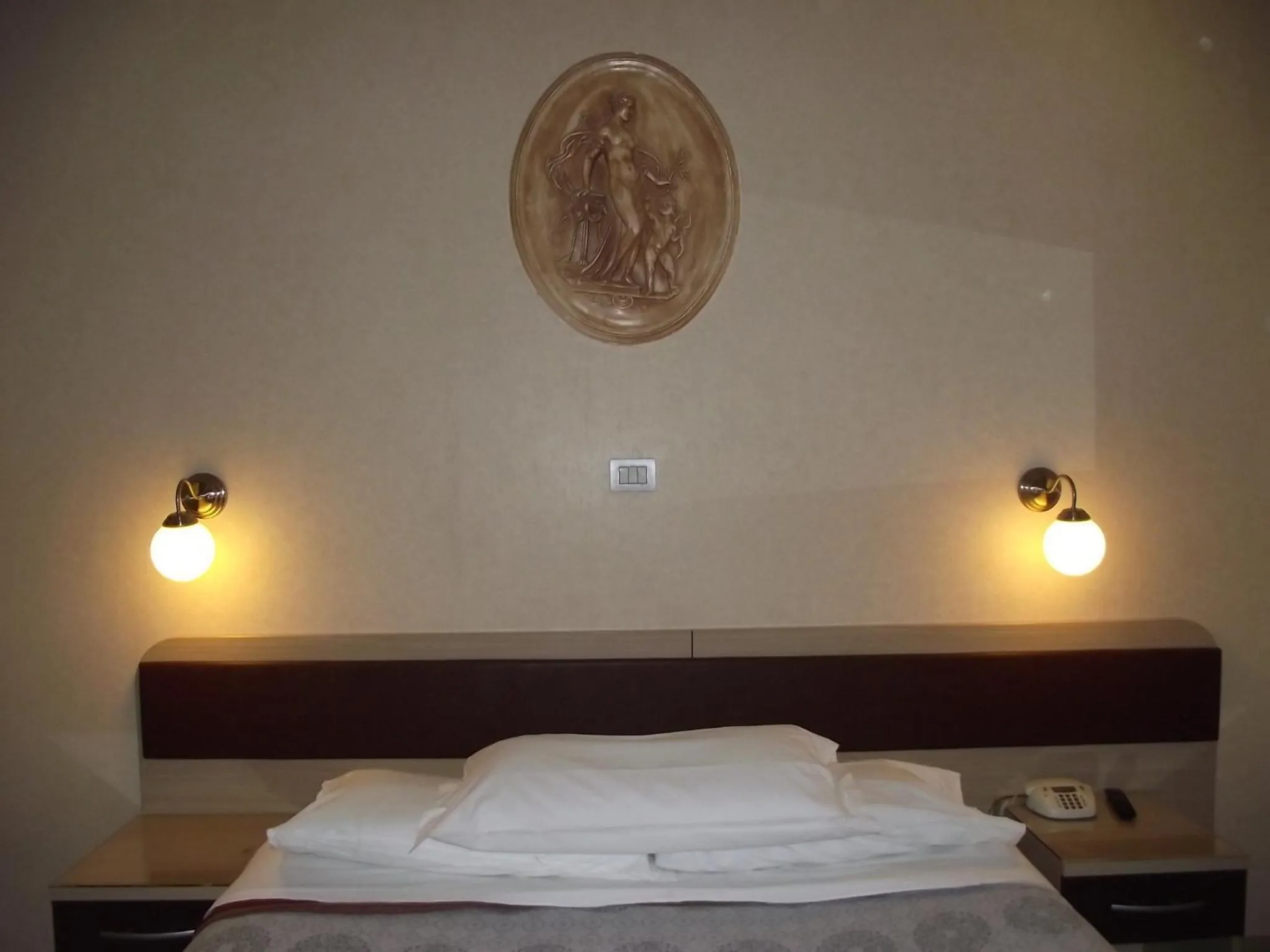 Bed in Hotel Elide