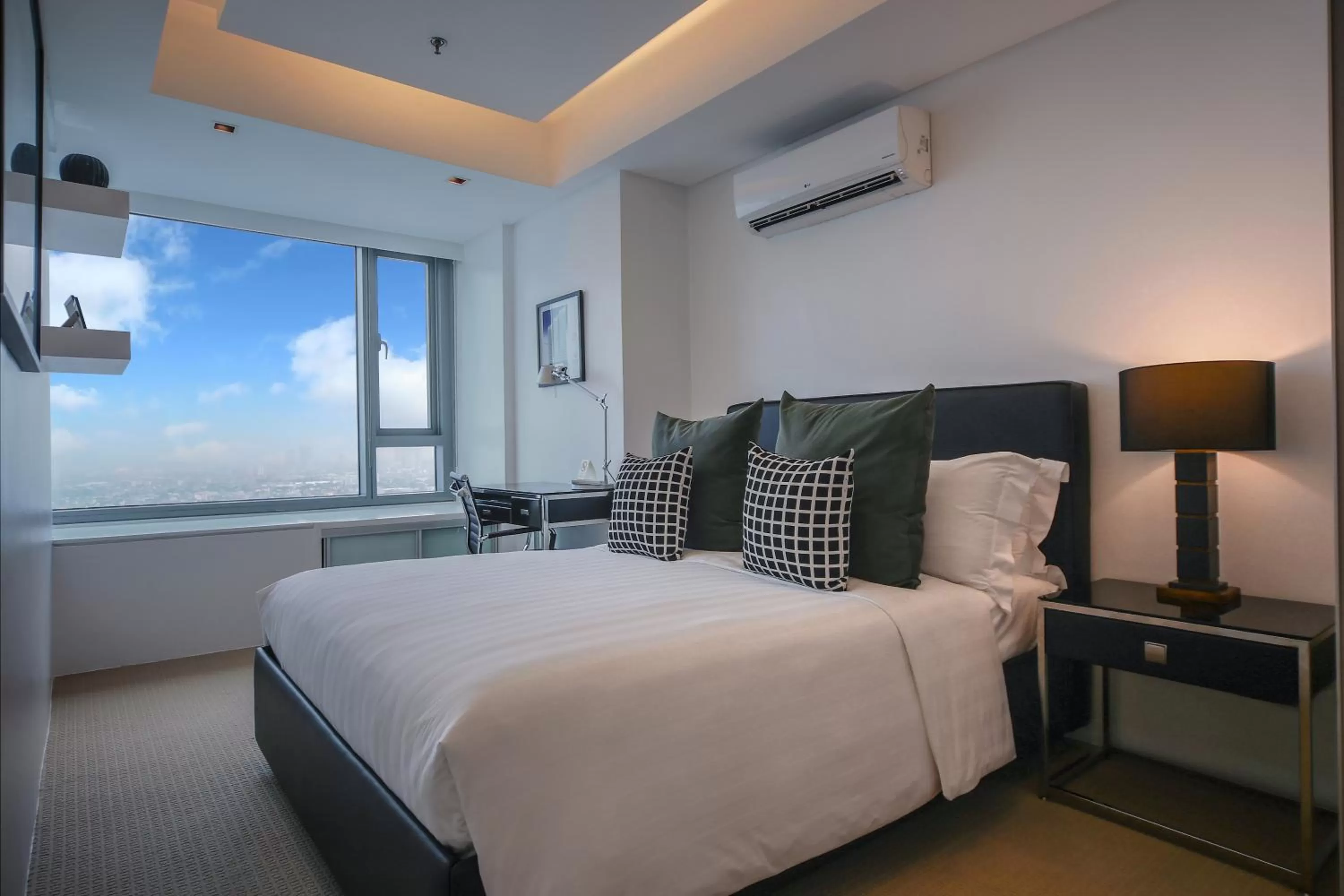 Bed in The Alpha Suites