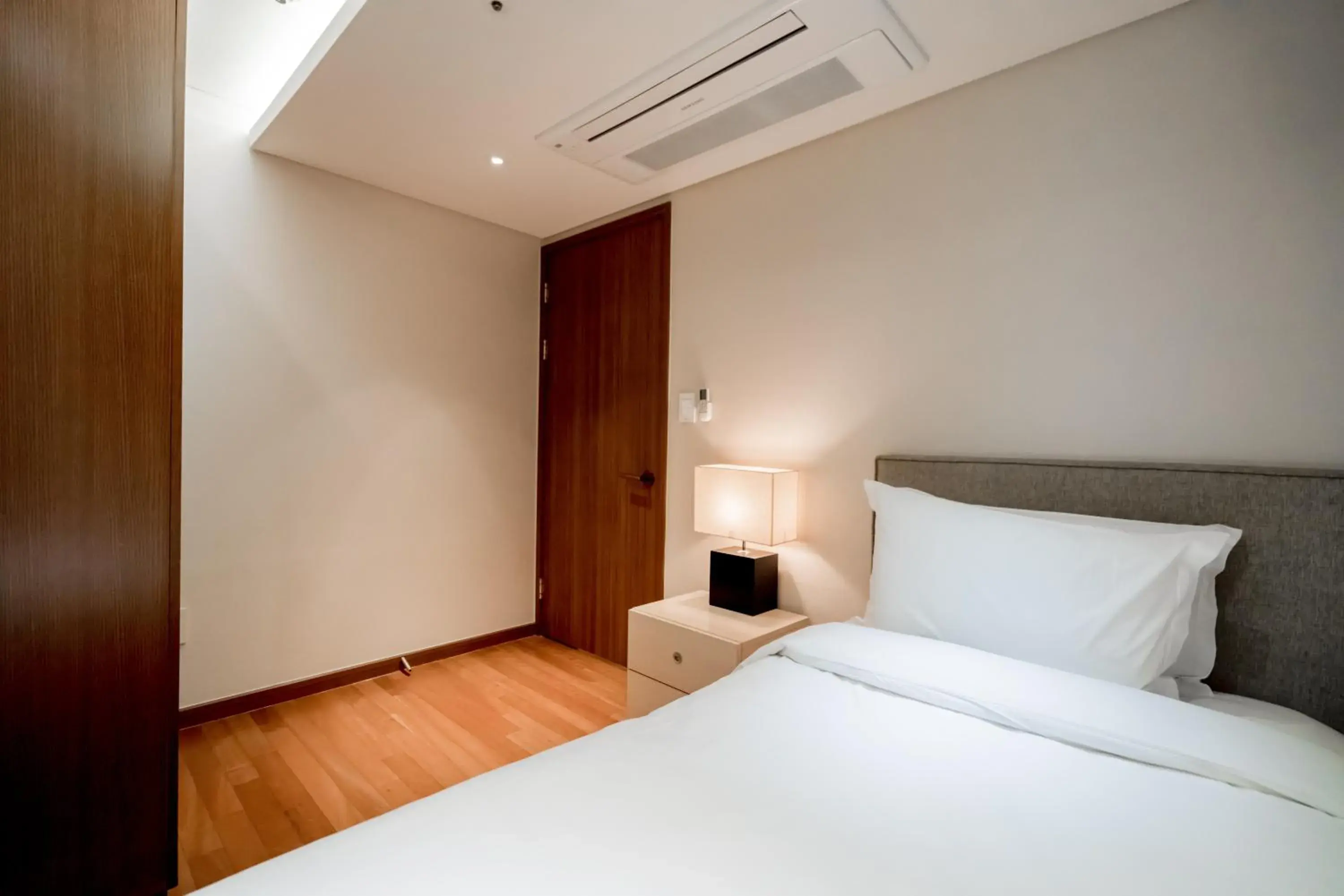 Bed in Oriens Hotel & Residences Myeongdong