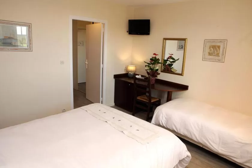 Photo of the whole room, Bed in Logis Hôtel Les Nymphéas