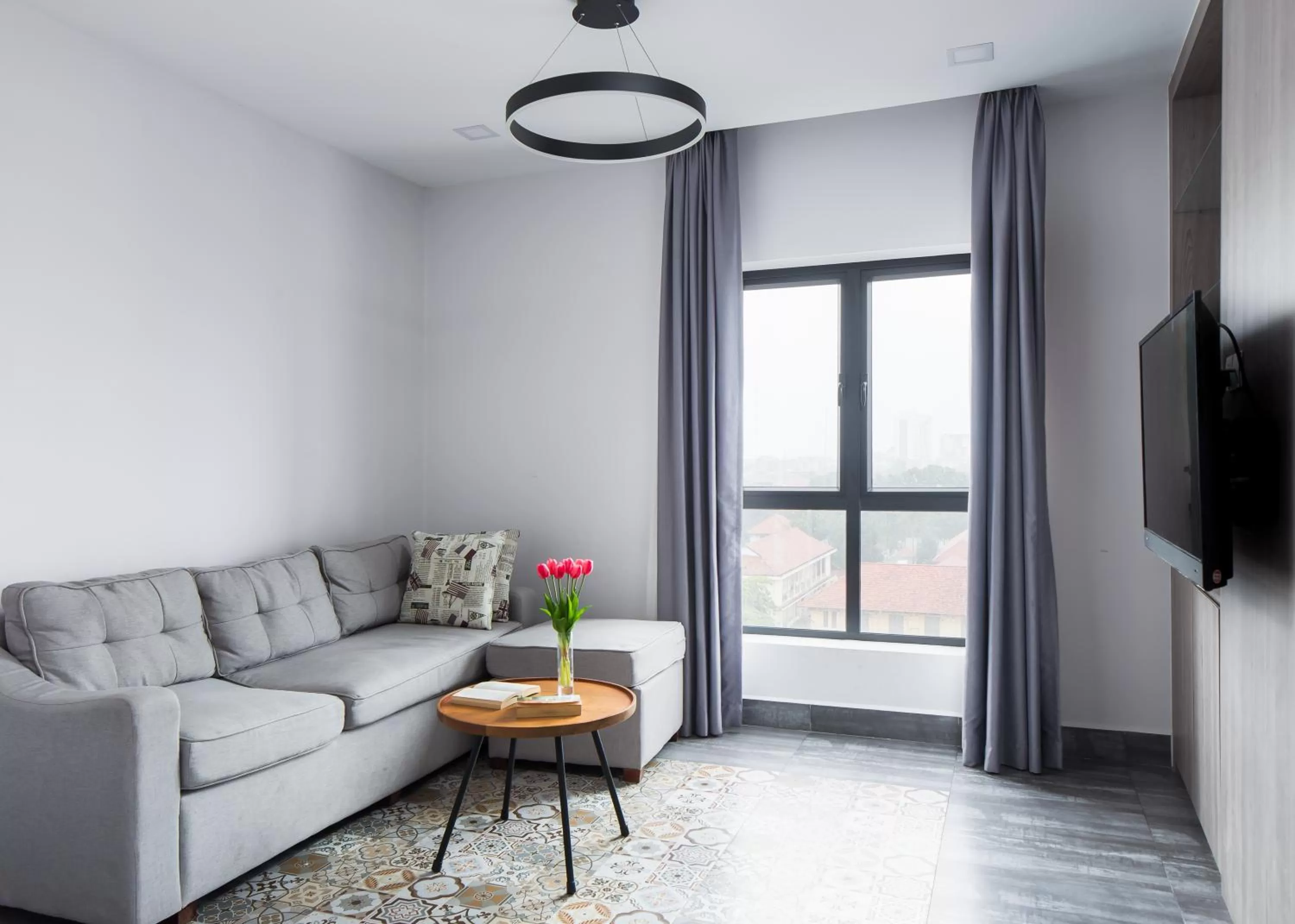 Communal lounge/ TV room in Phnom Penh 51 Hotel & Residences