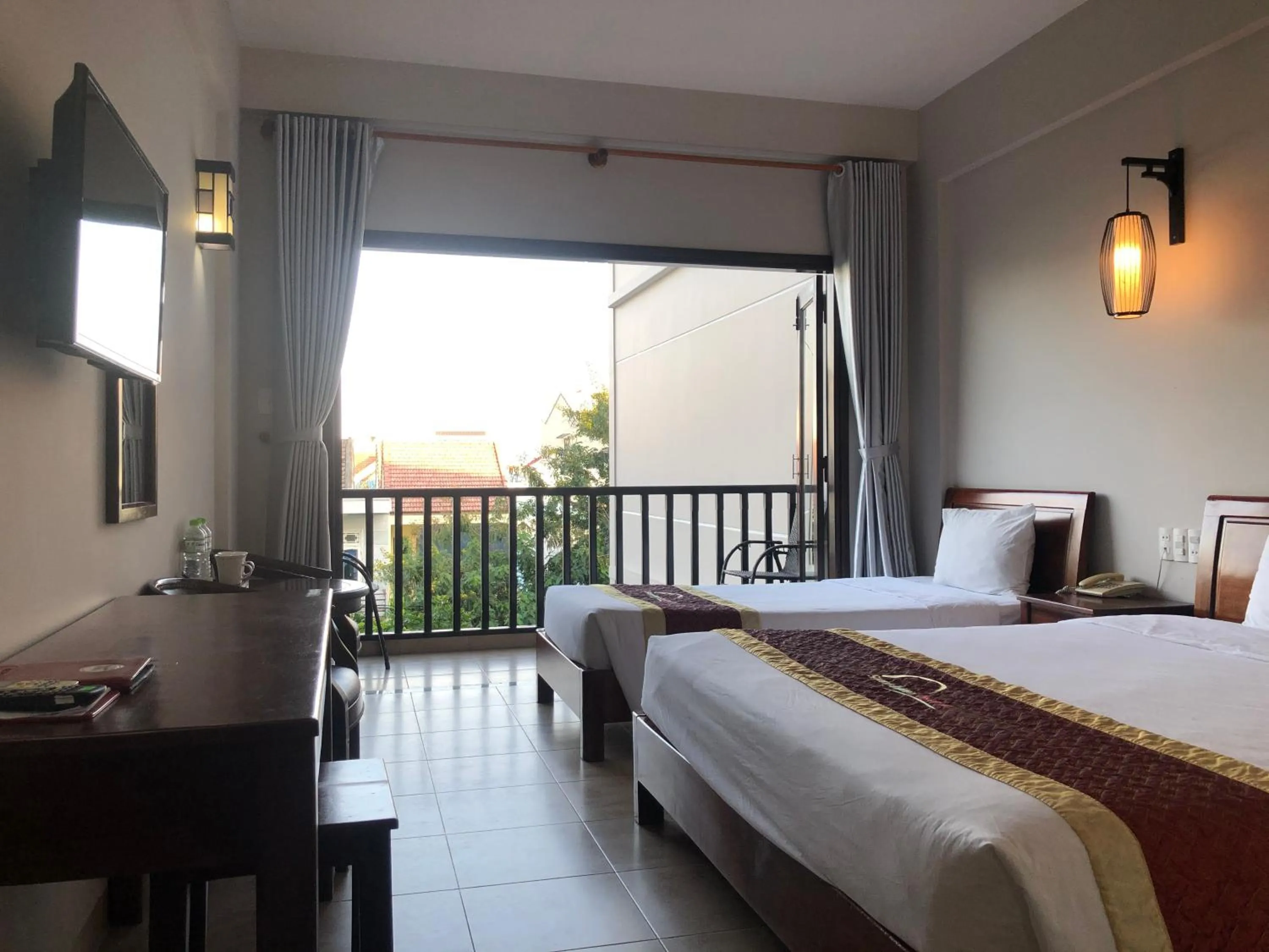 Bed in Sunshine Hoian Hotel