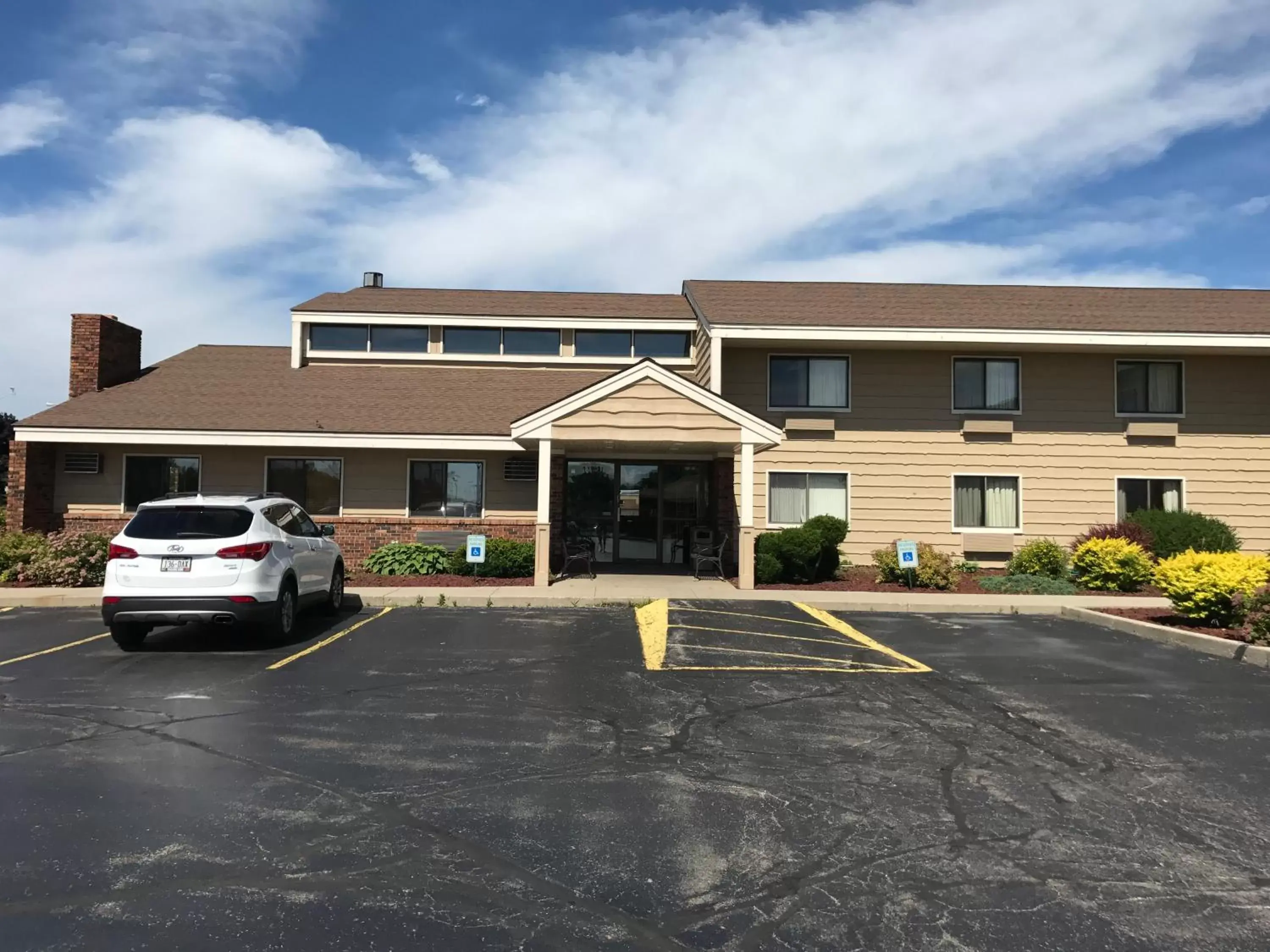 Property Building in AmericInn by Wyndham West Bend