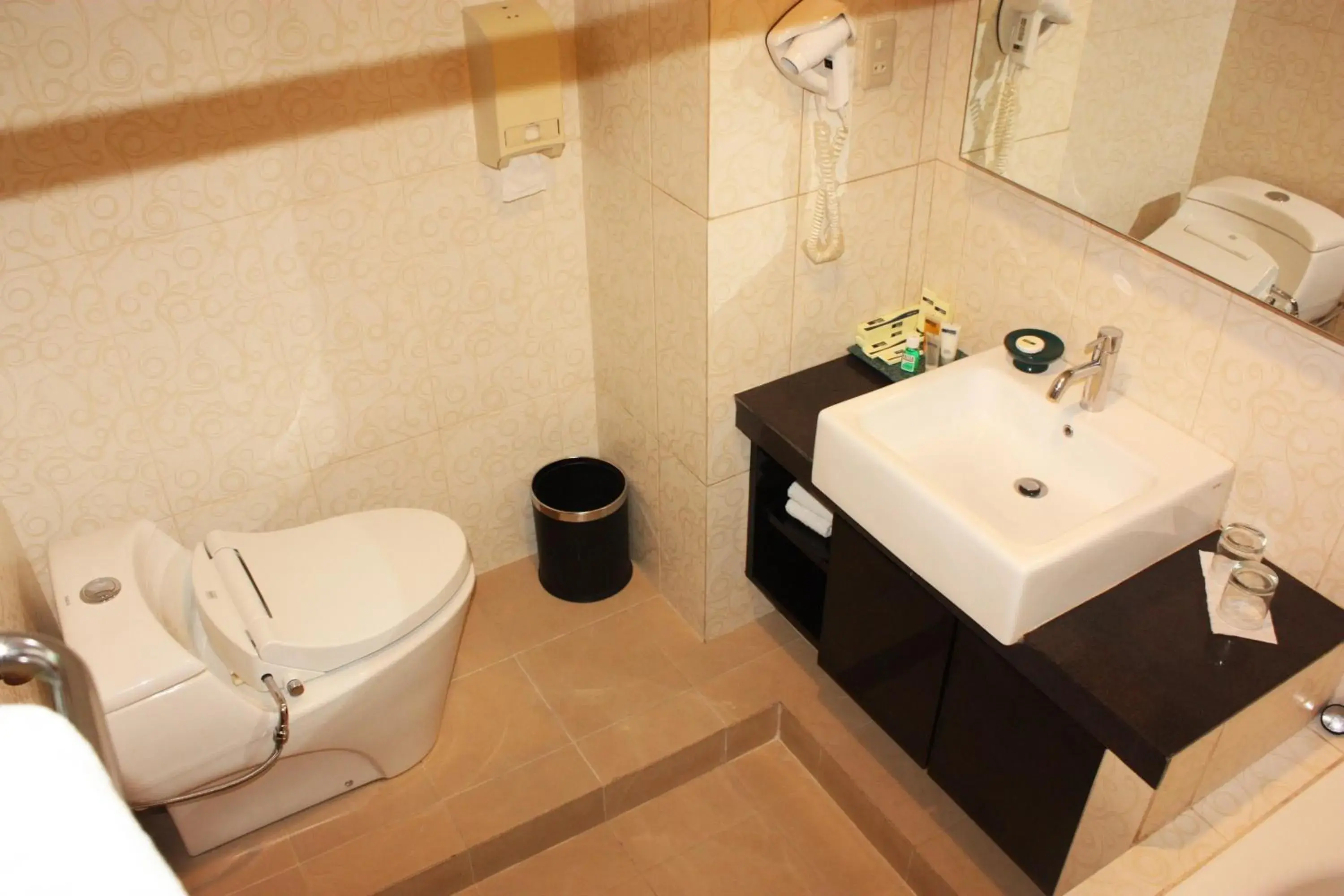 Bathroom in Travellers Suites Serviced Apartments