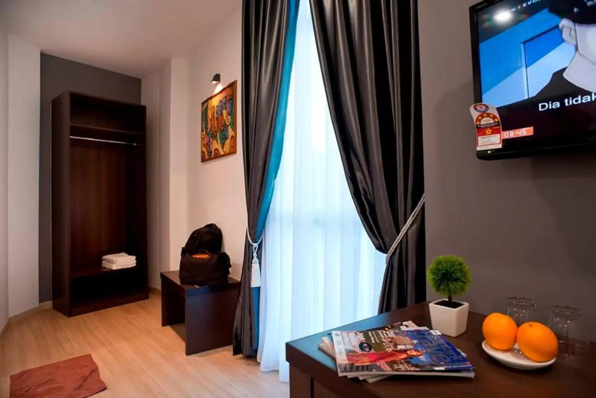 Bedroom, TV/Entertainment Center in Big Orange Hotel Sungai Petani