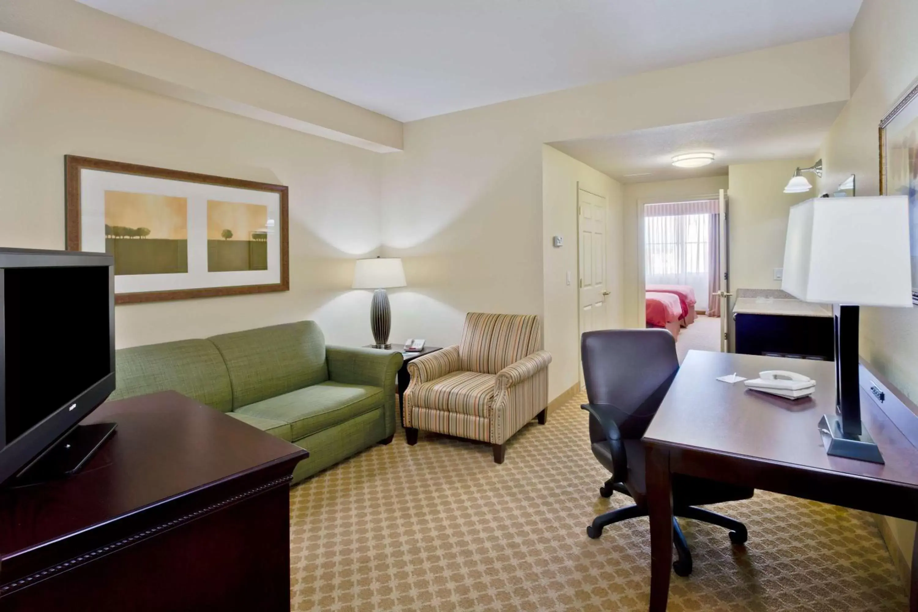 Photo of the whole room, Seating Area in Country Inn & Suites by Radisson, Port Charlotte, FL