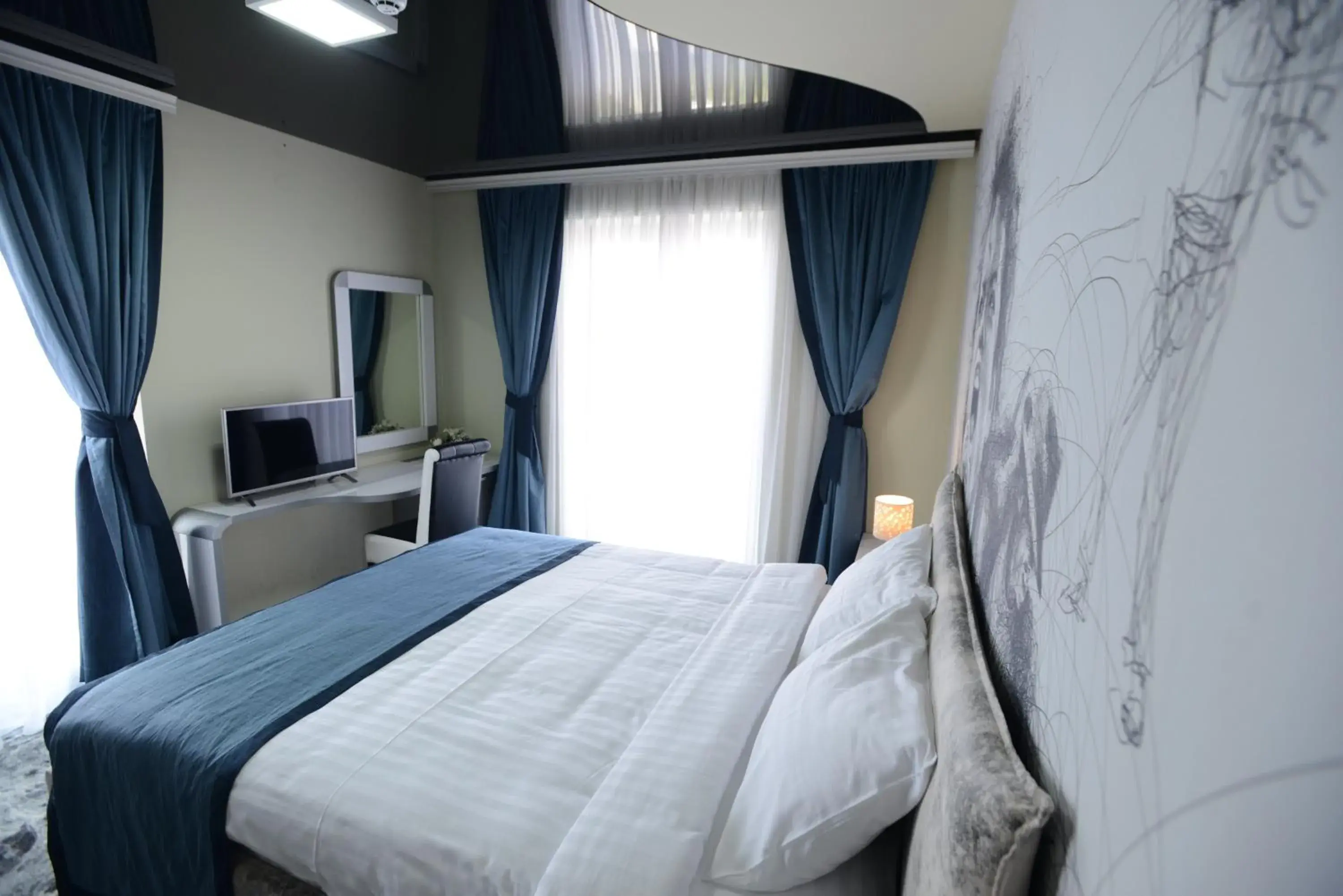 Bedroom, Bed in Garni Hotel Hollywoodland Wellness & Aquapark