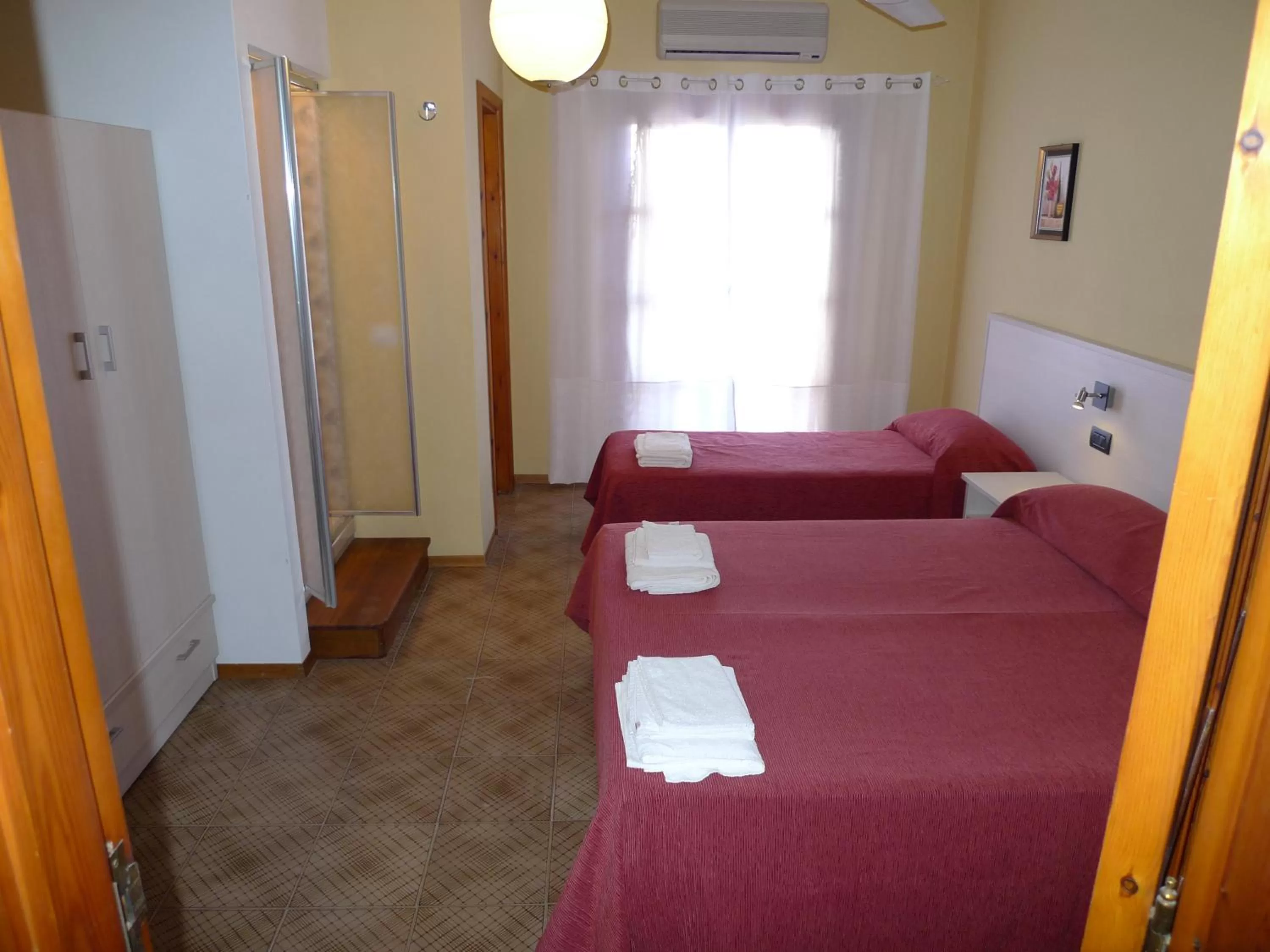 Bed in Hotel Alexander