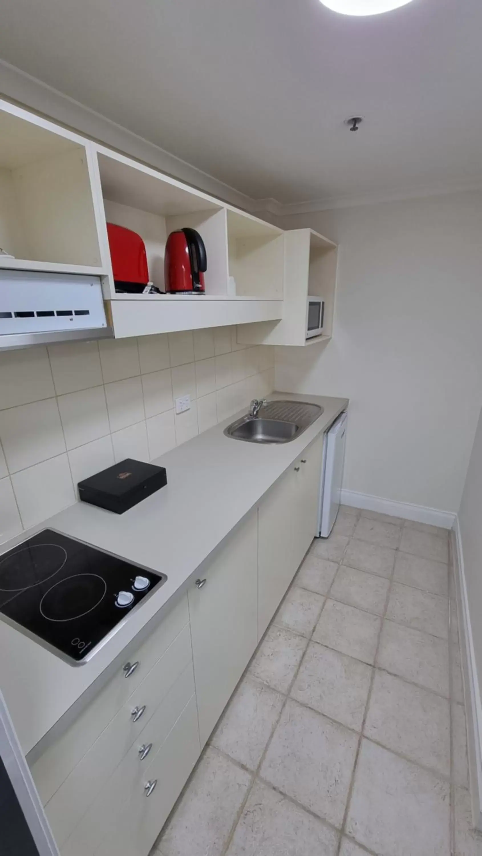 Kitchen or kitchenette, Kitchen/Kitchenette in Quality Apartments Melbourne Central
