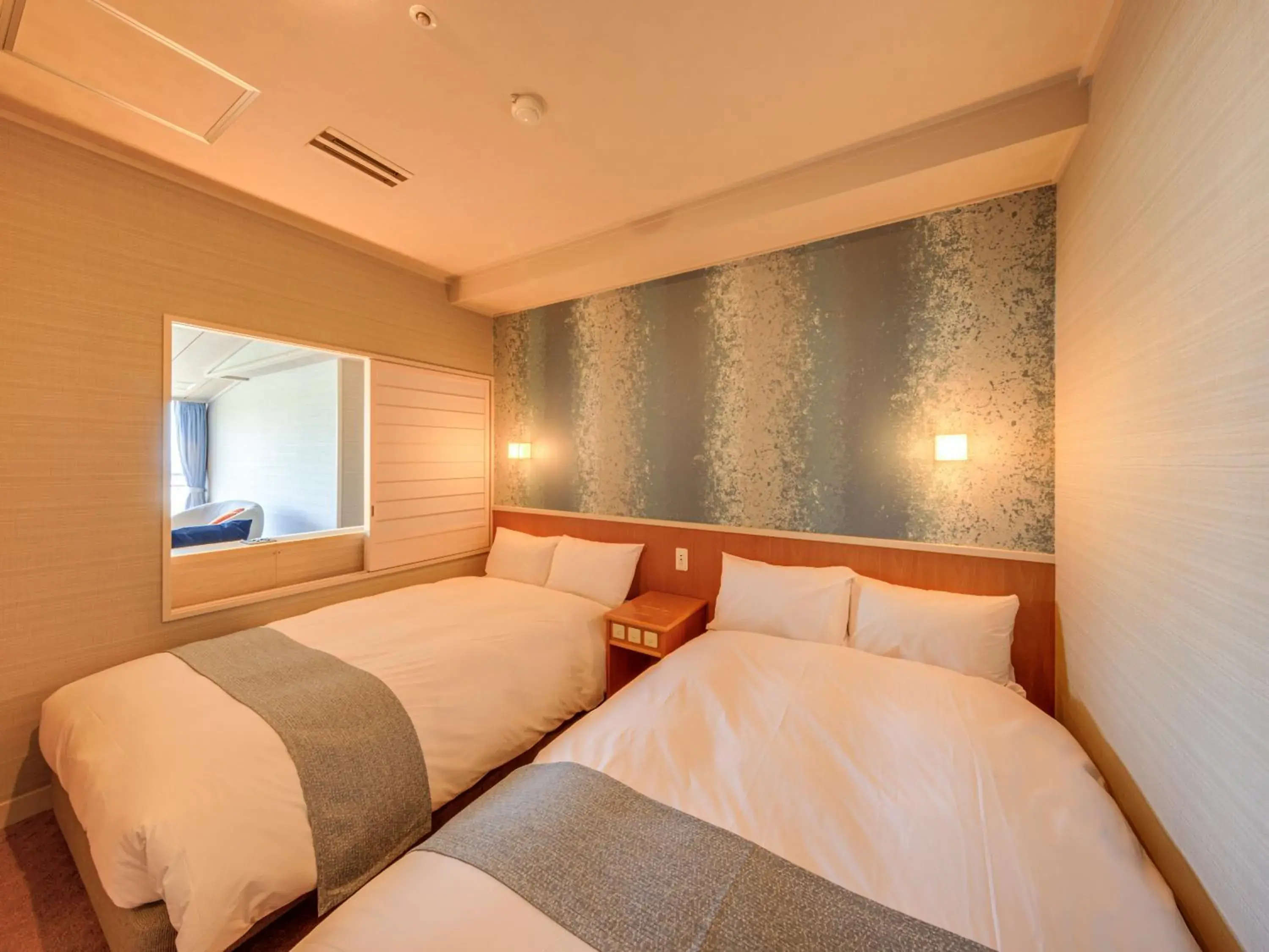 Bed in Ito Hotel Juraku Bed in Ito Hotel Juraku