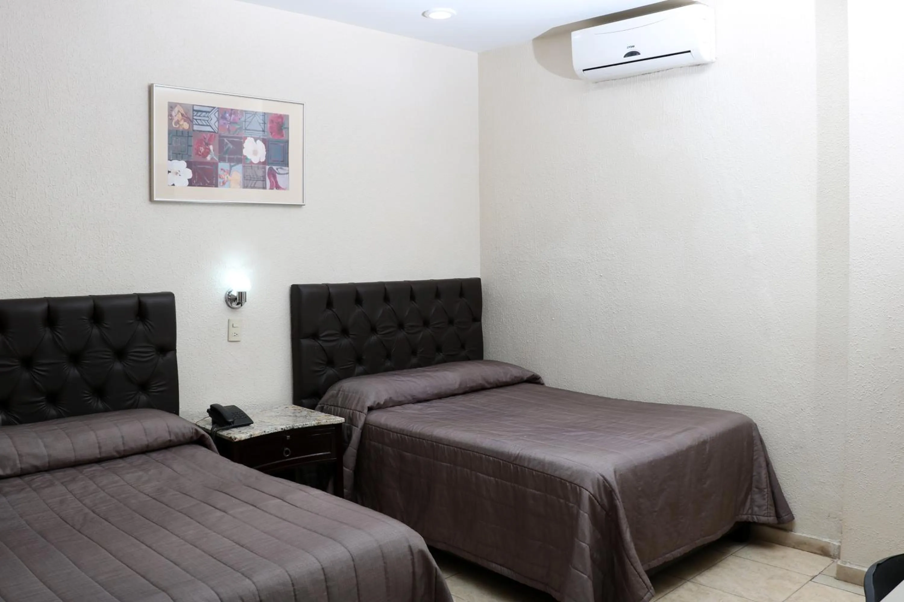 Bed in Hotel America Palacio