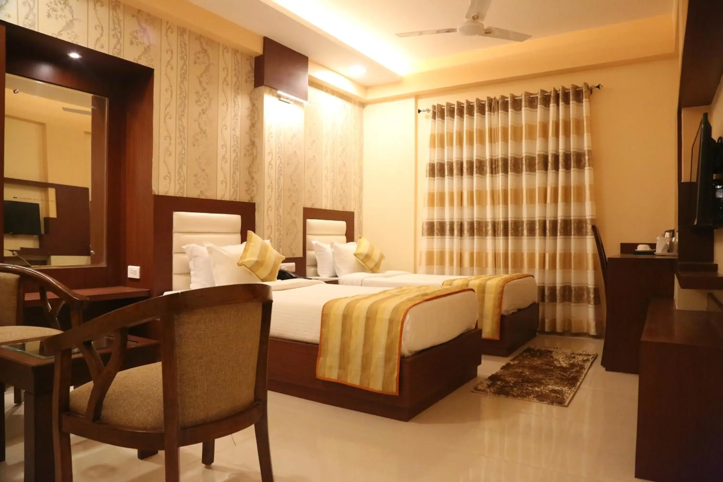 Photo of the whole room, Bed in Hotel Varanasi Inn