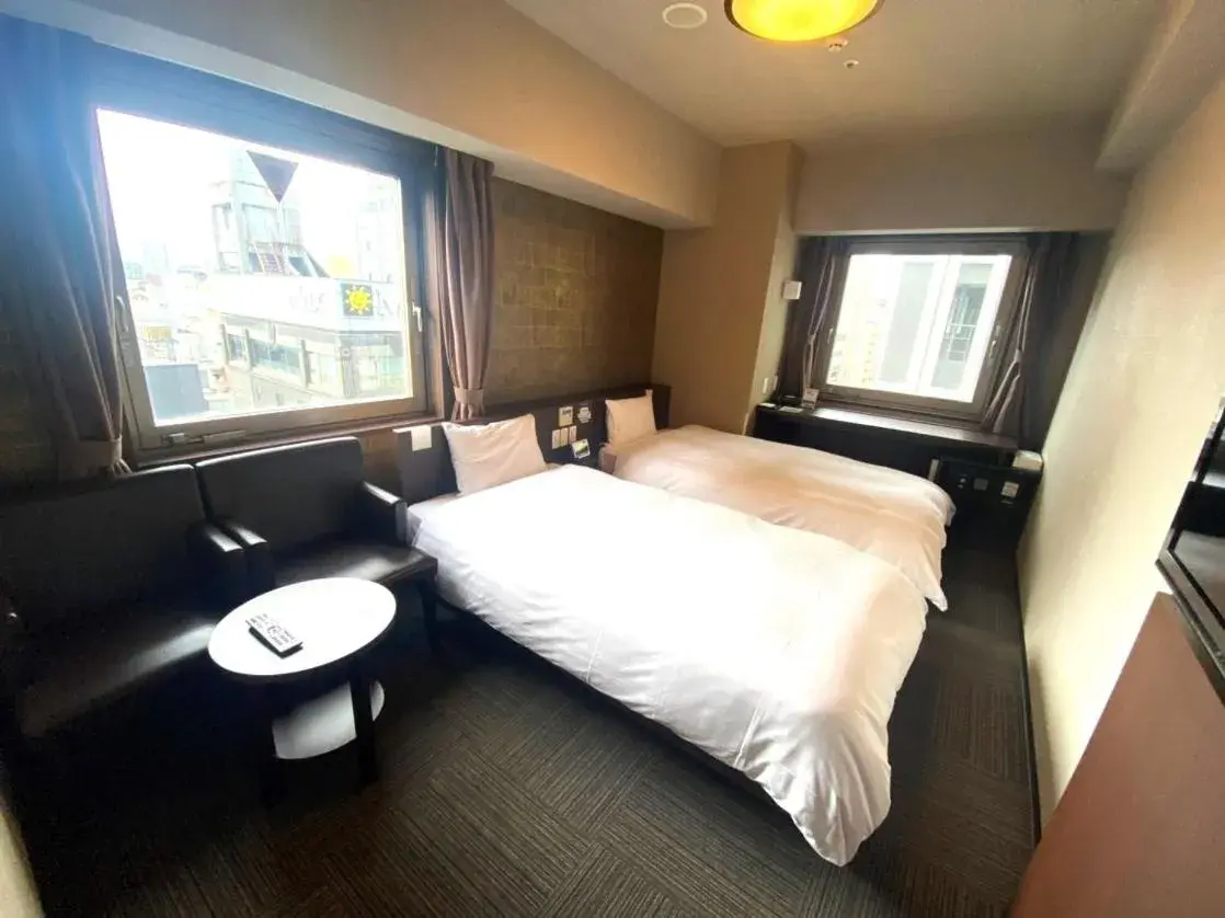 Bed in Dormy Inn Premium Namba Natural Hot Spring